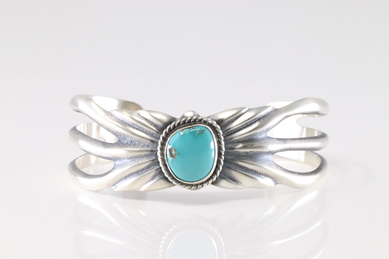 Native America Navajo Sterling Silver TurquoiseBracelet Cuff By Eugene Gruber.: This is a Native America Navajo Sterling Silver TurquoiseBracelet Cuff By Eugene Gruber.