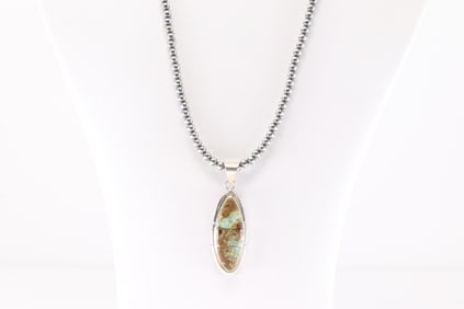 Native America Navajo Sterling Silver Number 8 Turquoise Inlay pendant By Steve Francisco. With