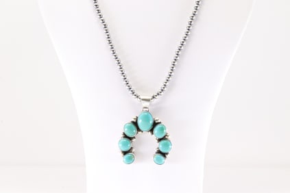 Native America Navajo Sterling Silver Kingmna Turquoise Naja Pendant By Augustine Largo. With Pearl