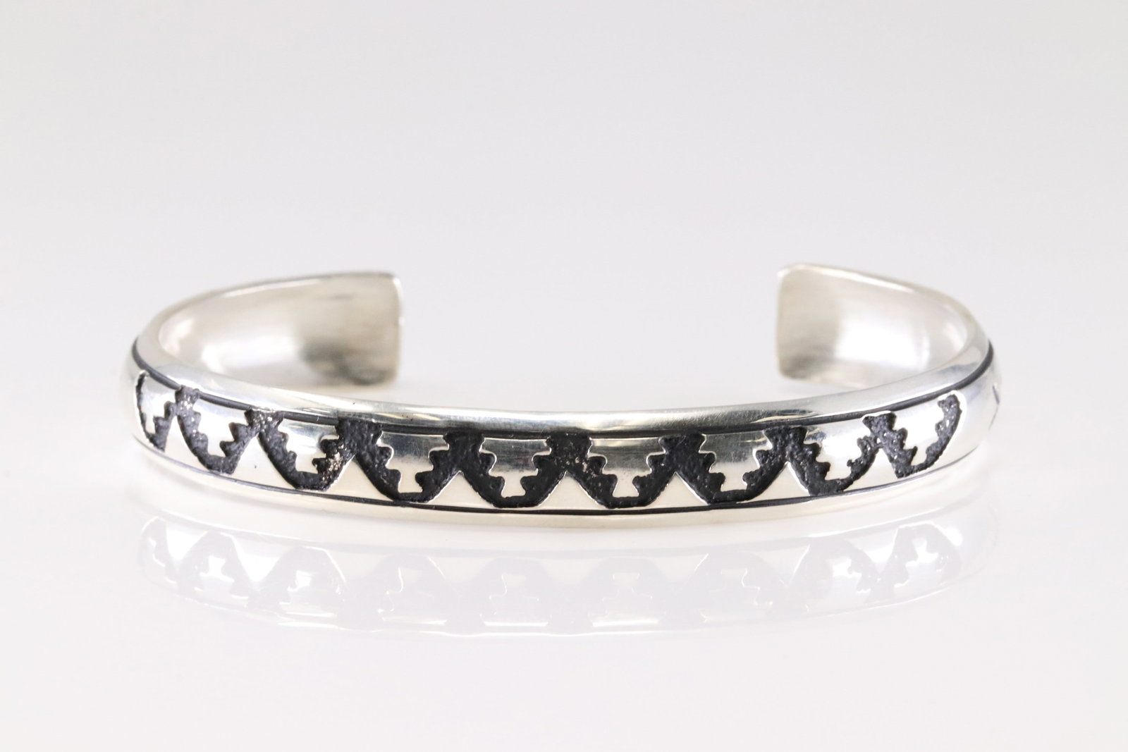 Native America Navajo Sterling Silver Stamped Bracelet Cuff By T&R Singer.: This is a Native America Navajo Sterling Silver Stamped Bracelet Cuff By T&R Singer.