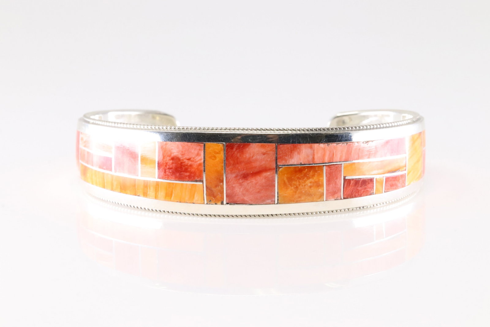 Native America Zuni Sterling Silver Spiny Oyster Inlay Bracelet Cuff By Glendora Booqua.: This is a Native America Zuni Sterling Silver Spiny Oyster Inlay Bracelet Cuff By Glendora Booqua.