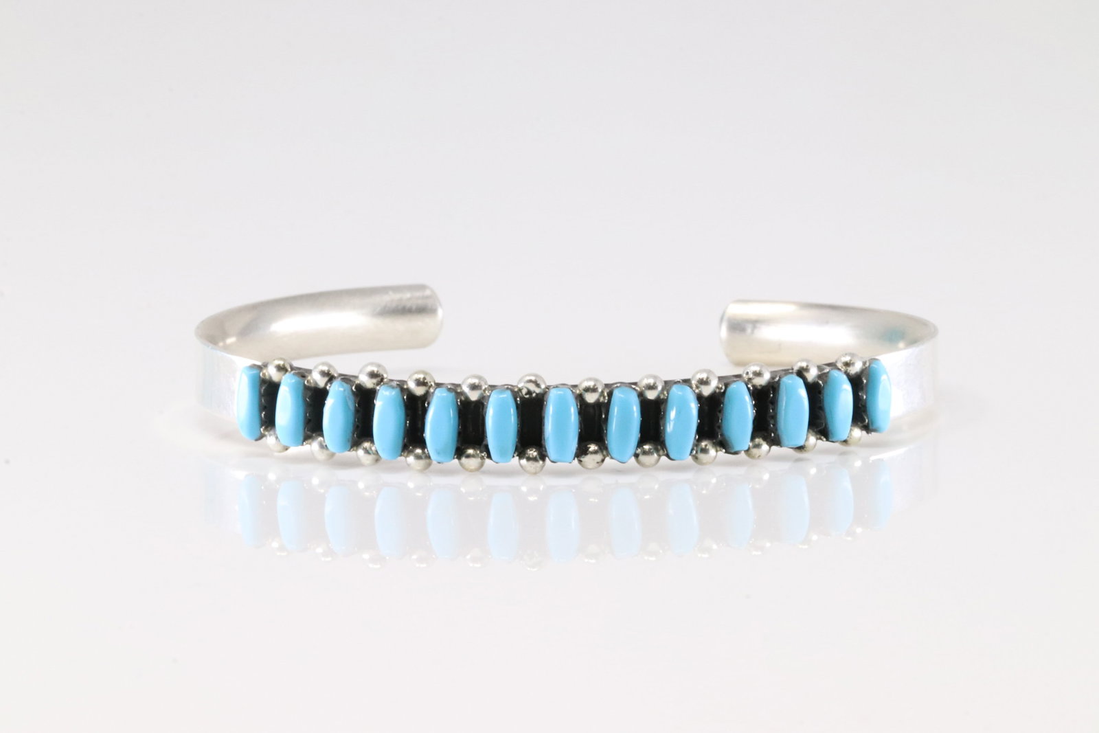 Native America Zuni Sterling Silver Turquoise Bracelet Cuff By Veronica Martza.: This is a Native America Zuni Sterling Silver Turquoise Bracelet Cuff By Veronica Martza.