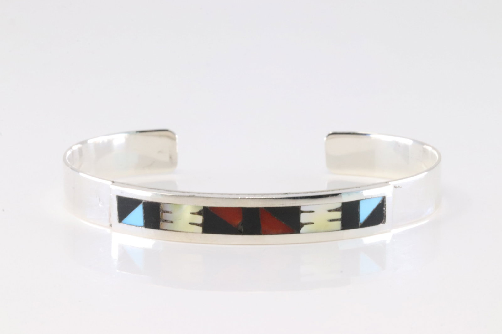 Native America Zuni Sterling Silver Multi-Color Stone Inlay Bracelet Cuff By Leander Othole.: This is a Native America Zuni Sterling Silver Multi-Color Stone Inlay Bracelet Cuff By Leander Othole.