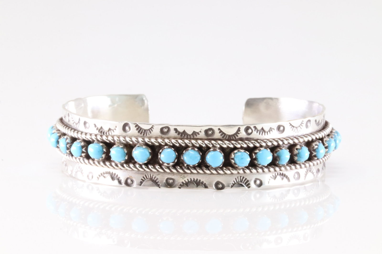 Native America Zuni Sterling Silver Turquoise Bracelet Cuff By Pearl Ukestine.: This is a Native America Zuni Sterling Silver Turquoise Bracelet Cuff By Pearl Ukestine.