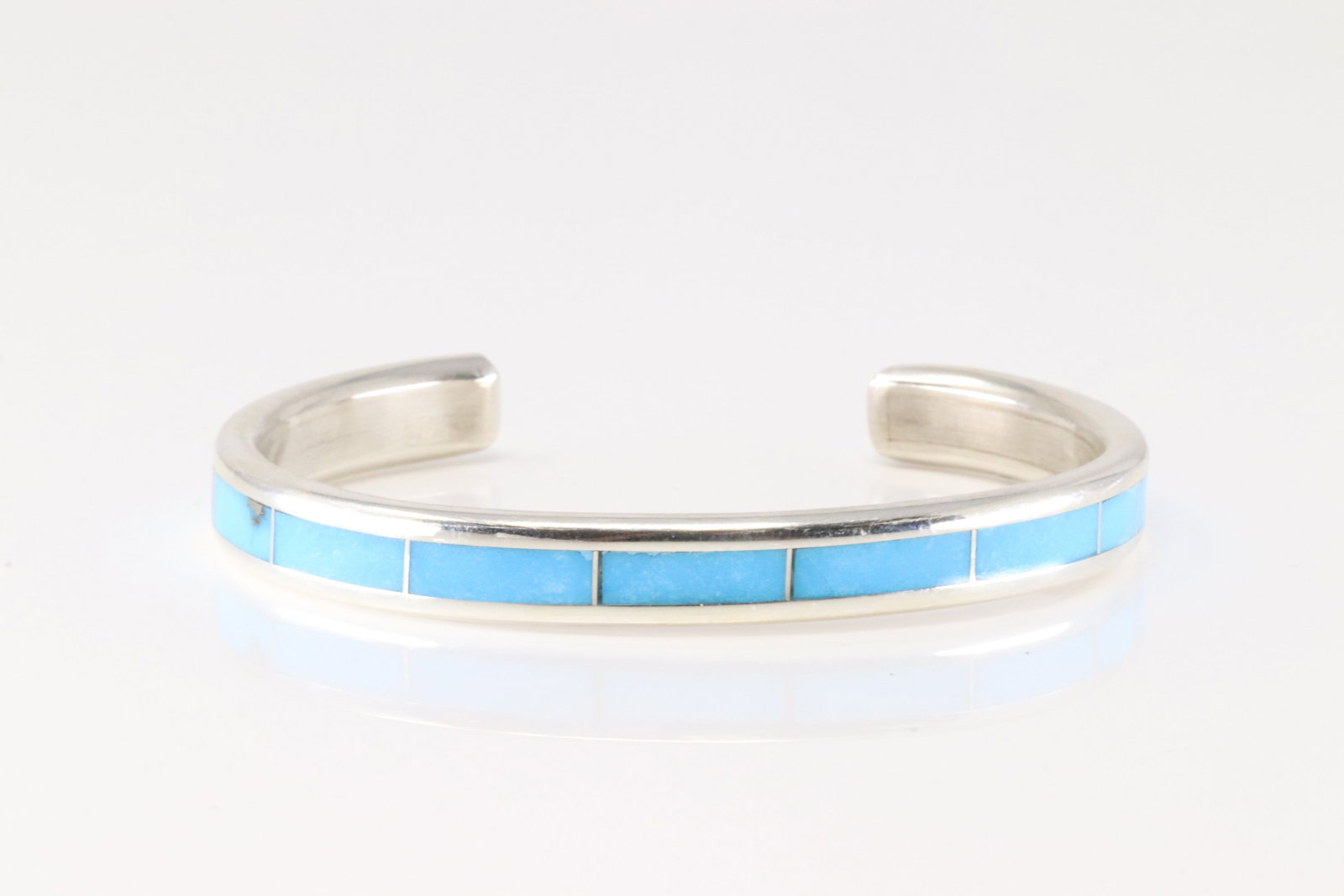 Native America Zuni Sterling Silver Turquoise Inlay Bracelet Cuff By Loretta.: This is a Native America Zuni Sterling Silver Turquoise Inlay Bracelet Cuff By Loretta.
