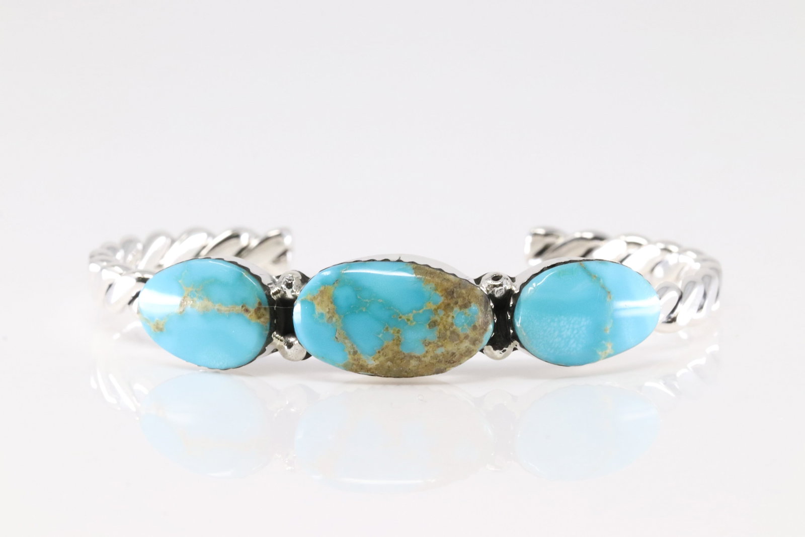 Native America Navajo Sterling Silver Turquoise Bracelet Cuff By Sadie Jim.: This is a Native America Navajo Sterling Silver Turquoise Bracelet Cuff By Sadie Jim.