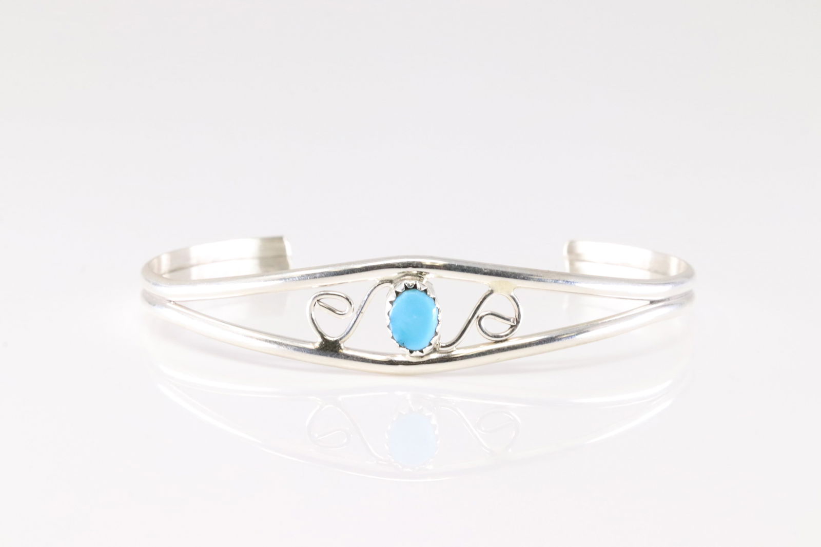 Native America Navajo Sterling Silver Turquoise Bracelet Cuff By F.: This is a Native America Navajo Sterling Silver Turquoise Bracelet Cuff By F.