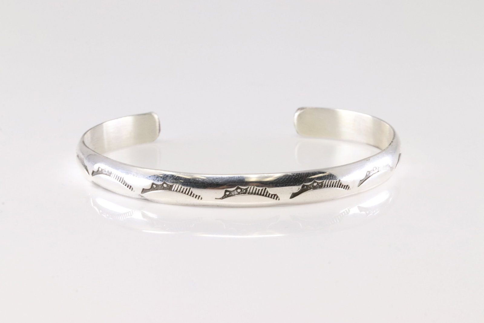 Native America Navajo Sterling Silver Solid Stamped Bracelet Cuff By Gary Sandoval.: This is a Native America Navajo Sterling Silver Solid Stamped Bracelet Cuff By Gary Sandoval.