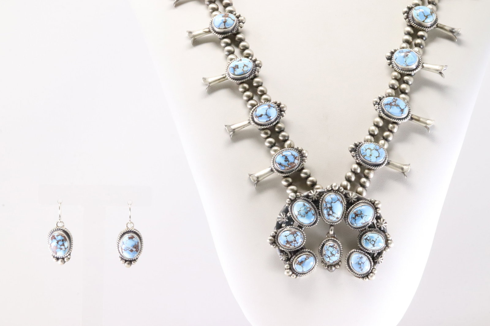Native America Navajo Sterling Silver Golden Hill Turquoise Squash Blossom Necklace & Earring's Set: This is a Native America Navajo Sterling Silver Golden Hill Turquoise Squash Blossom Necklace & Earring's Set By Thomas Francisco. 26.00" Total weight: 161.20 Grams.