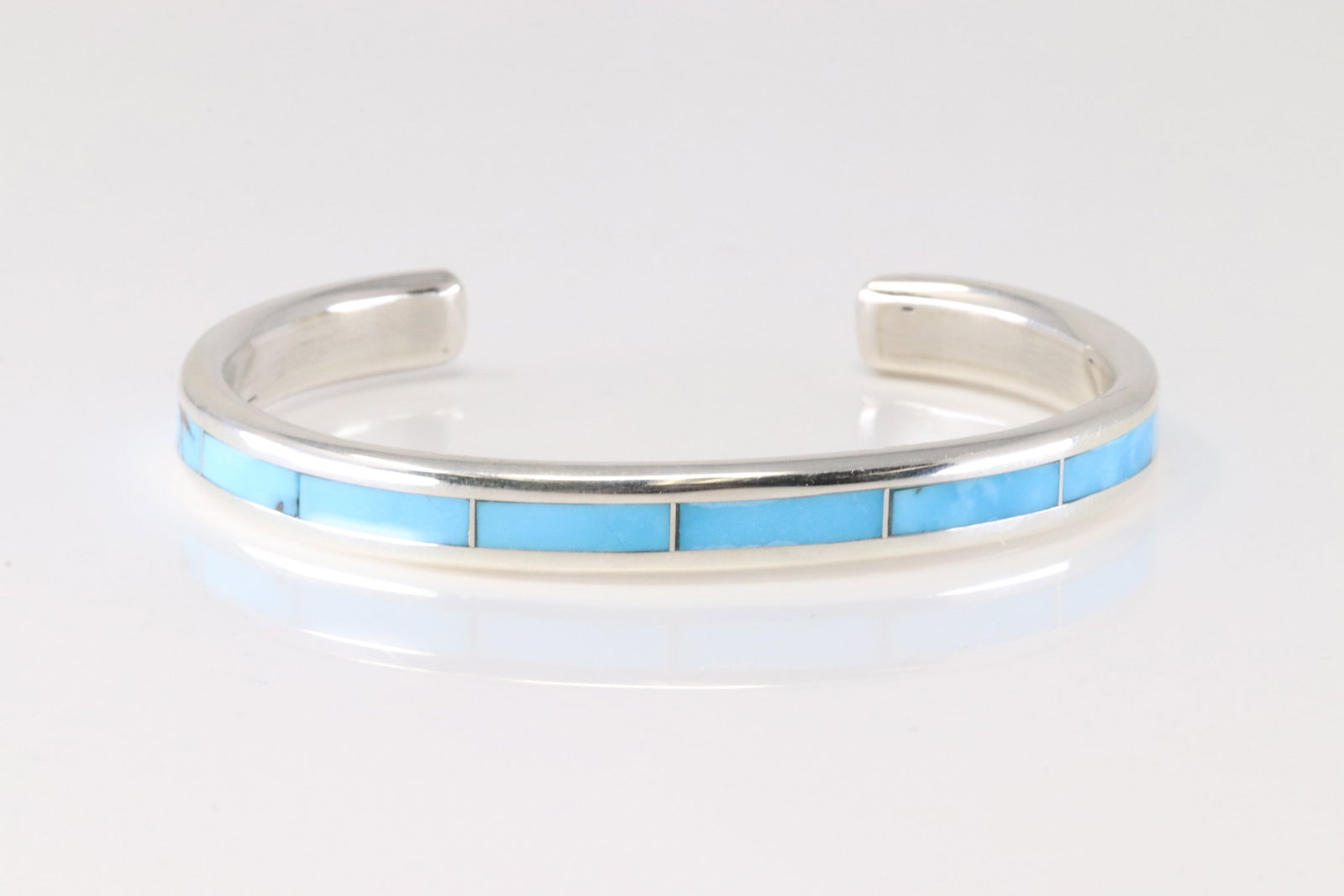 Native America Zuni Sterling Silver Turquoise Inlay Bracelet Cuff By Lawrence Lorett.: This is a Native America Zuni Sterling Silver Turquoise Inlay Bracelet Cuff By Lawrence Lorett.