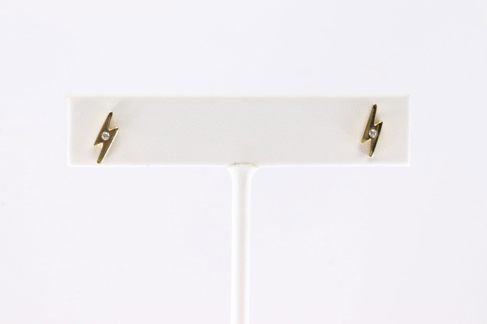 Diamond Stud Earring 14Kt.: Ladies 14Kt Yellow Gold Diamond Stud Earring's. This Earring's have A Lightning Design With 2 Round Brilliant Diamonds.