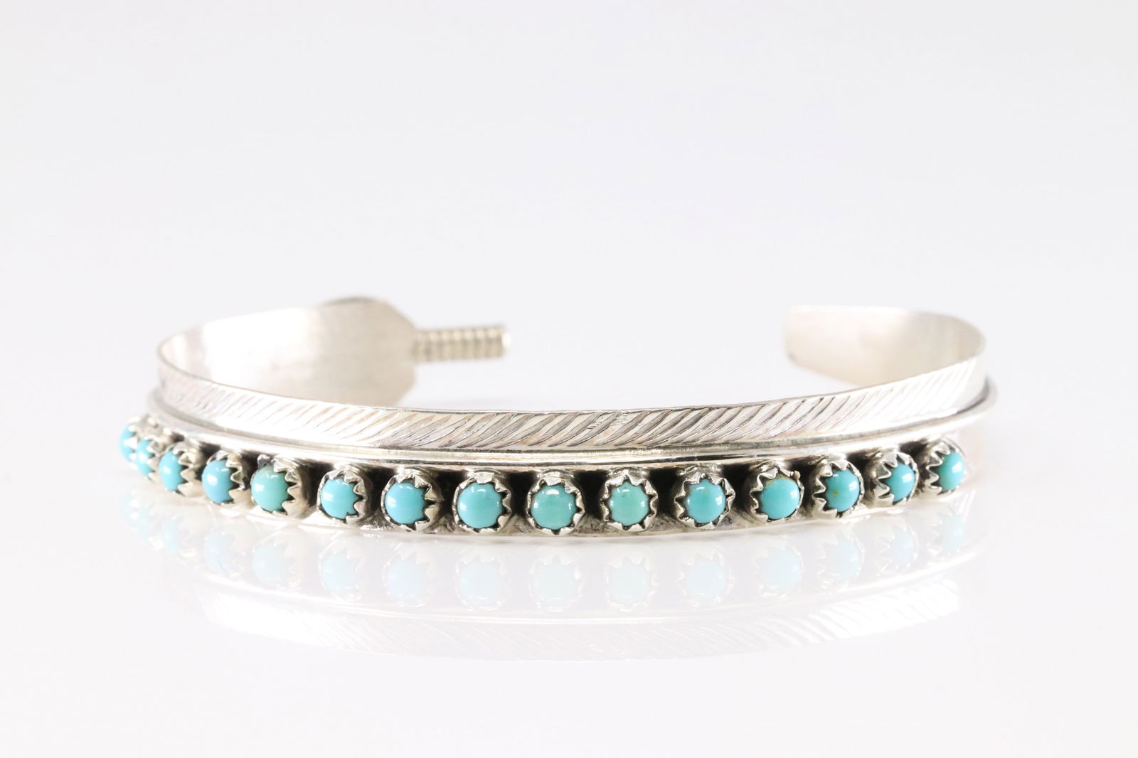 Native America Navajo Sterling Silver Turquoise Bracelet Feather Cuff By Aaron Davis.: This is a Native America Navajo Sterling Silver Turquoise Bracelet Feather Cuff By Aaron Davis.
