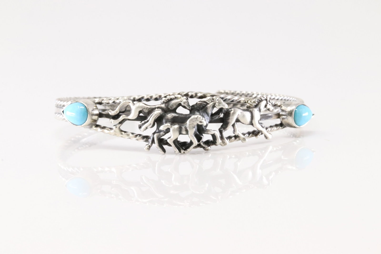 Native America Navajo Sterling Silver Turquoise Horse Bracelet Cuff By Bobby Platero.: This is a Native America Navajo Sterling Silver Turquoise Horse Bracelet Cuff By Bobby Platero.