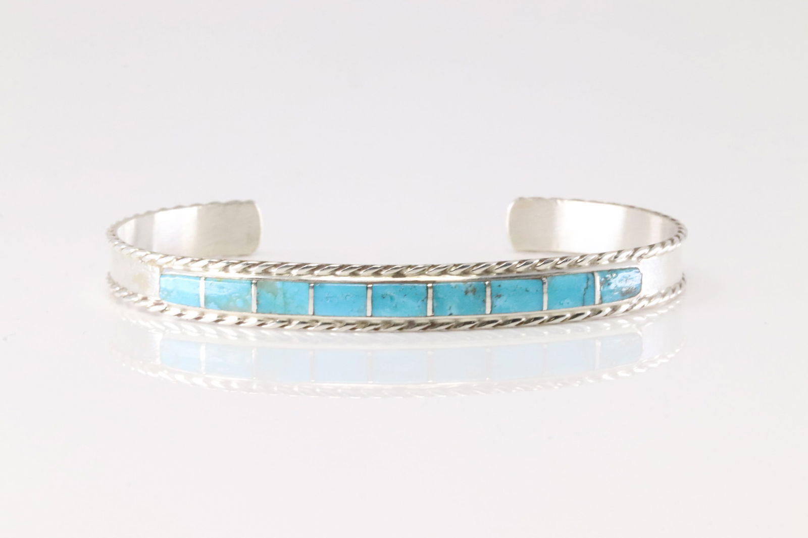 Native America Navajo Sterling Silver Turquoise Inlay Bracelet Cuff By J.P.: This is a Native America Navajo Sterling Silver Turquoise Inlay Bracelet Cuff By J.P.
