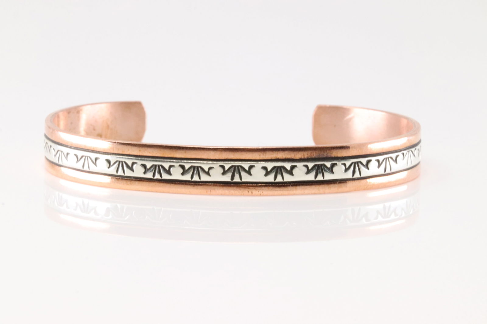 Native America Navajo Sterling Silver Cooper Bracelet Cuff By Wylie Secatero.: This is a Native America Navajo Sterling Silver Cooper Bracelet Cuff By Wylie Secatero.