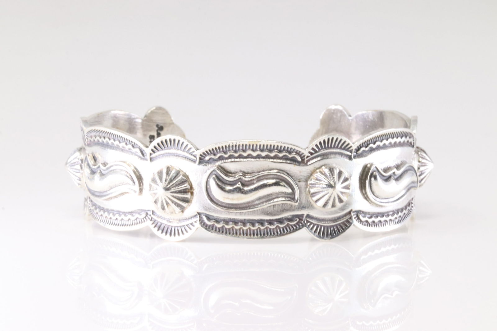 Native America Navajo Sterling Silver Solid Stamped Bracelet Cuff By Roland Dixson.: This is a Native America Navajo Sterling Silver Solid Stamped Bracelet Cuff By Roland Dixson. Stamp Roland Dixson.