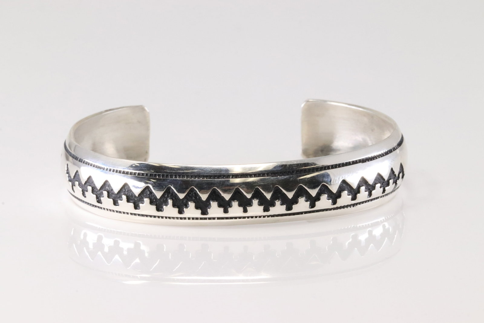 Native American Navajo Sterling Silver Stamped Bracelet Cuff By T/R Singer.: This is a Native American Navajo Sterling Silver Stamped Bracelet Cuff By T/R Singer.