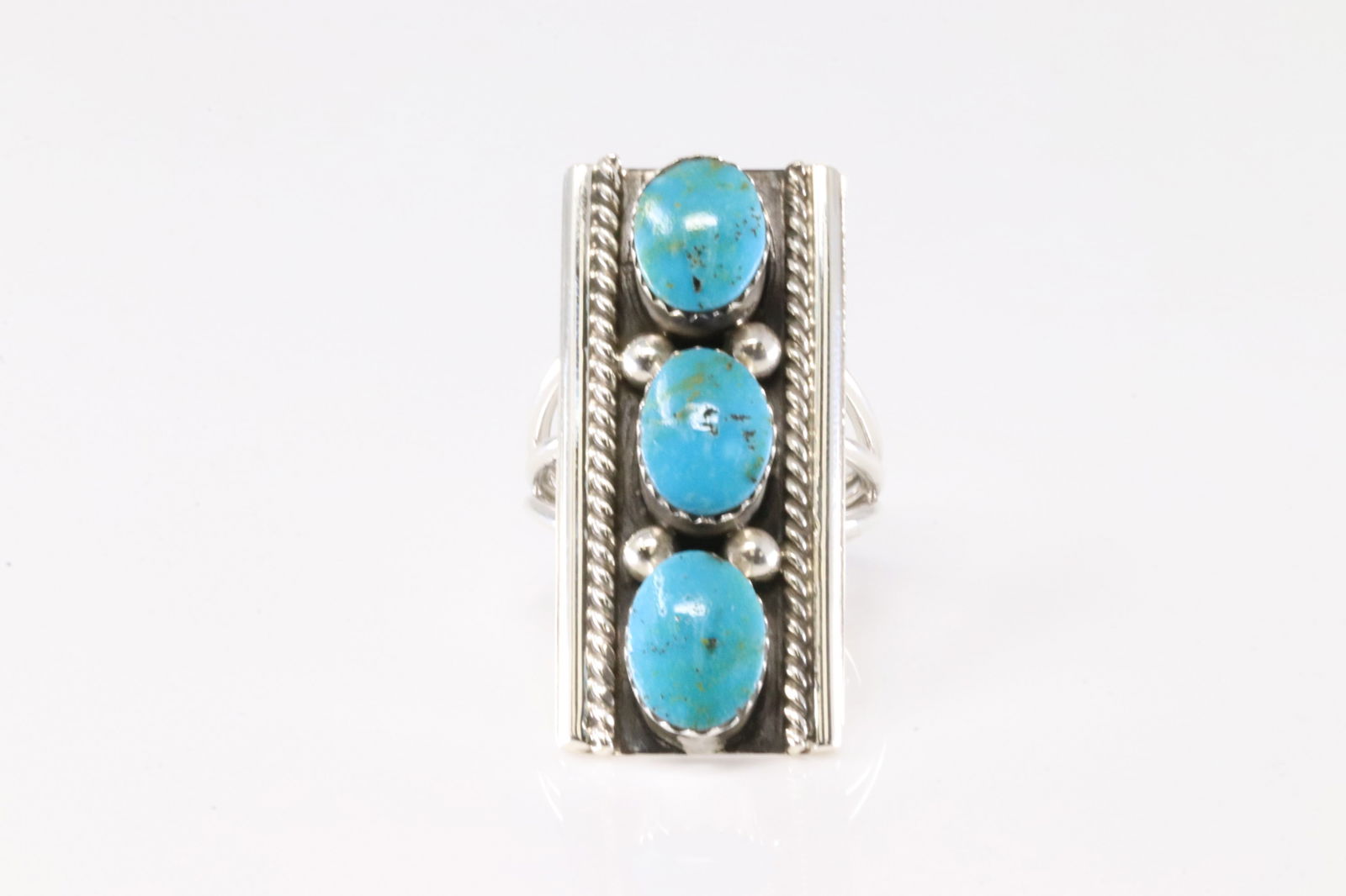 Native American Navajo Sterling Silver Turquoise Ring 3 Stone By Arlene Lewis.: This is a Native American Navajo Sterling Silver Turquoise Ring 3 Stone By Arlene Lewis. Satmpe A. Ring size: 8.50.