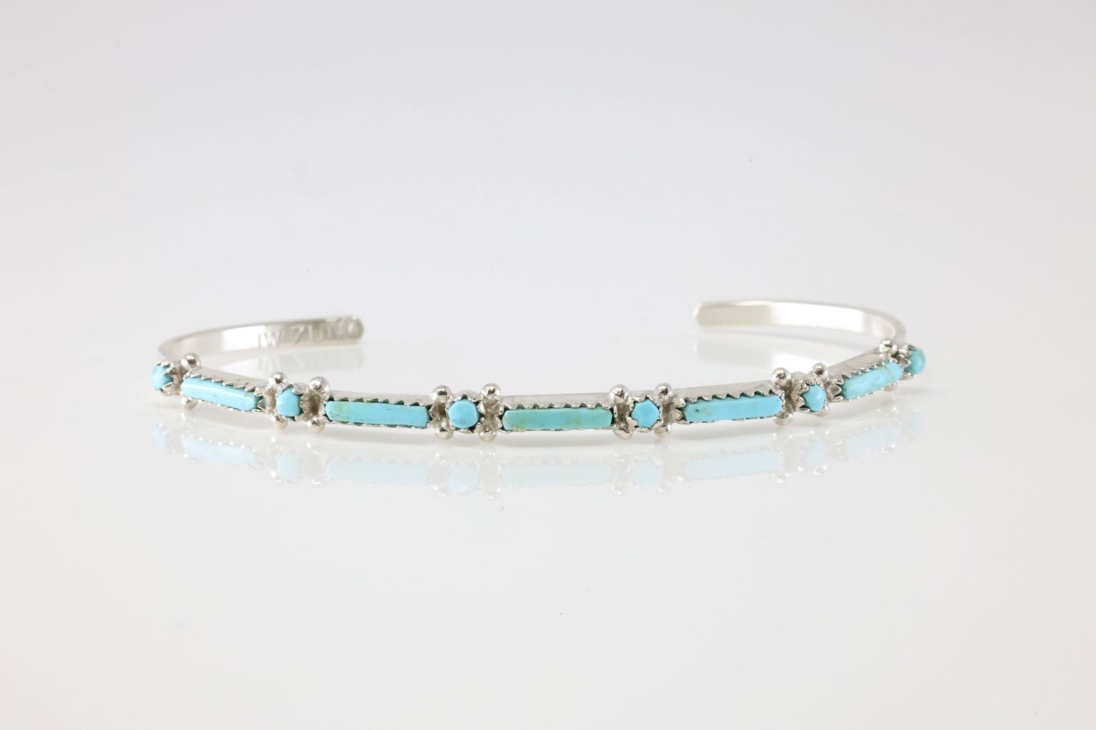 Native America Zuni Sterling Silver Turquoise Bracelet Cuff By IW.: This is a Native America Zuni Sterling Silver Turquoise Bracelet Cuff By IW. Stamp IW Zuni.