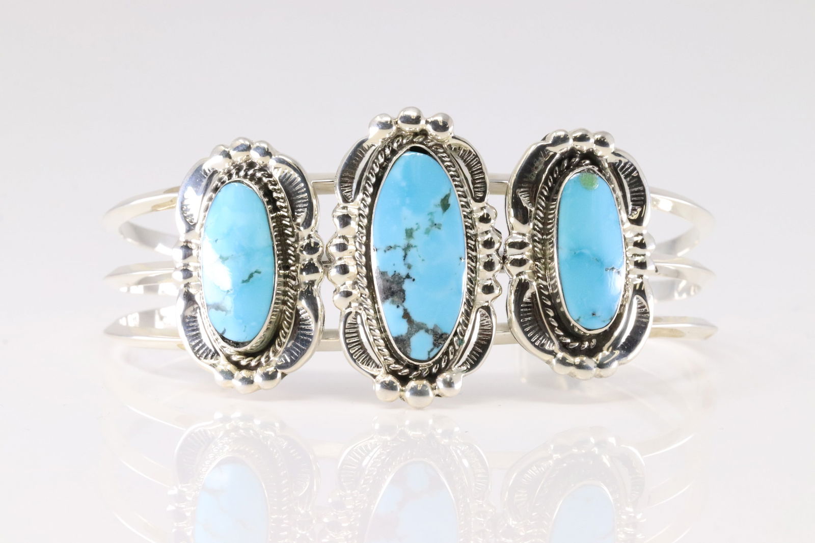 Native America Navajo Sterling Silver Turquoise Barcelet 3 Stone Cuff By Irvin Tsosie. From R.B: This is a Native America Navajo Sterling Silver Turquoise Barcelet 3 Stone Cuff By Irvin Tsosie. From R.B Company. Stamp R.B.
