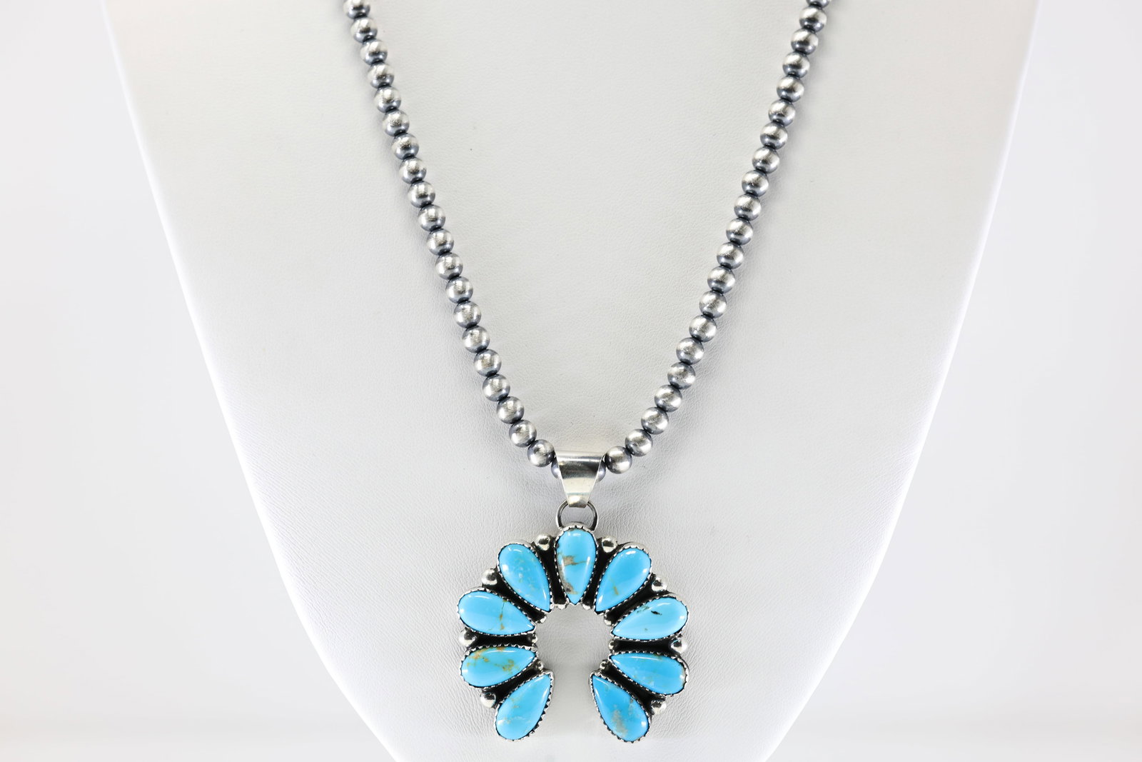 Native America Navajo Sterling Silver Turquoise Pendant By T.Smith. With Machine Made Pearl Beaded: This is a Native America Navajo Sterling Silver Turquoise Pendant By T.Smith. With Machine Made Pearl Beaded Sterling Silver Necklace. Necklace length: 20.00"