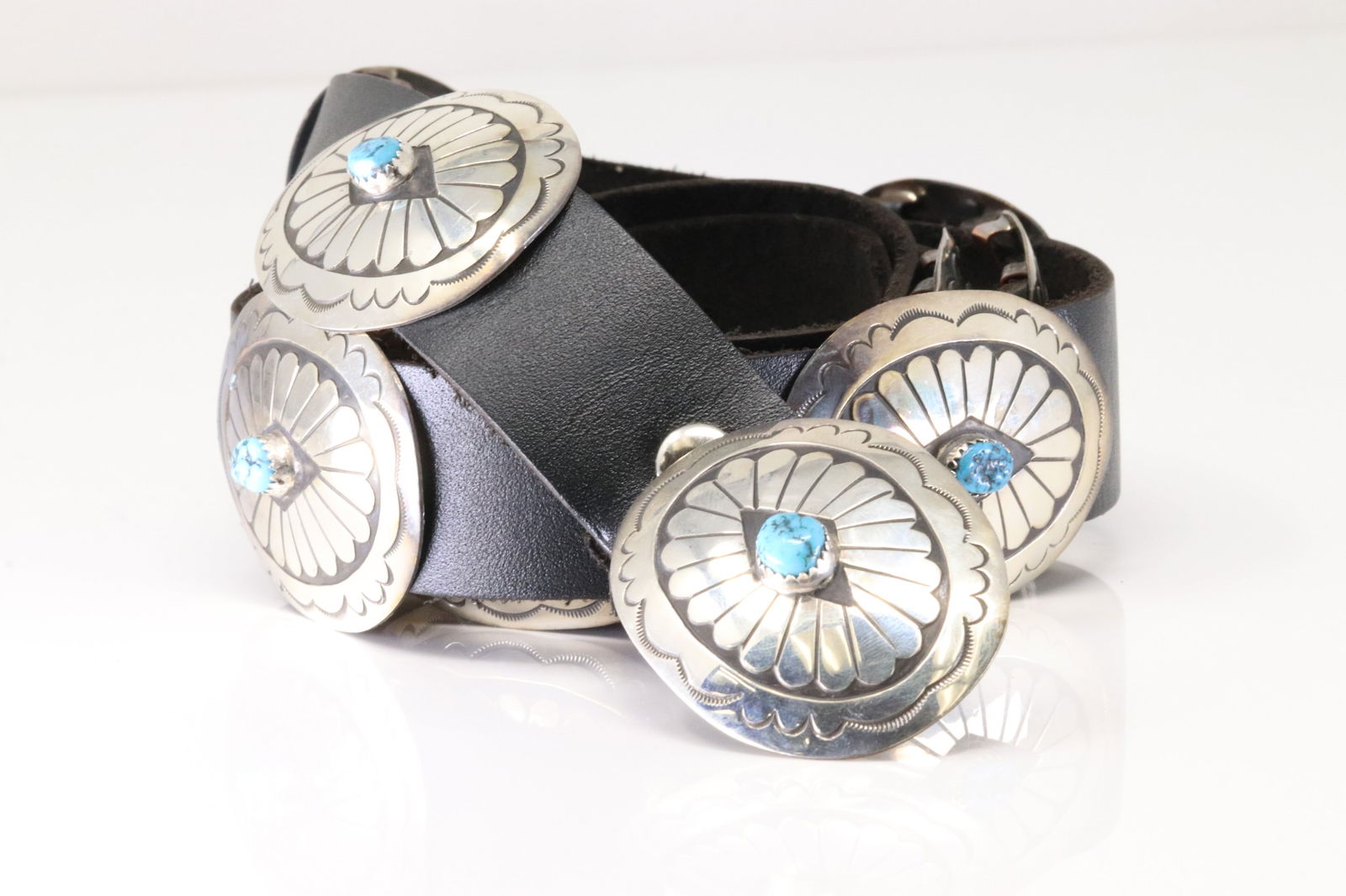 Native America Navajo Sterling Silver Turquoise Leather Black Belt By J.B.: This is a Native America Navajo Sterling Silver Turquoise Leather Black Belt By J.B. Belt Length: 52.00" Total weight: 177.60 Grams.
