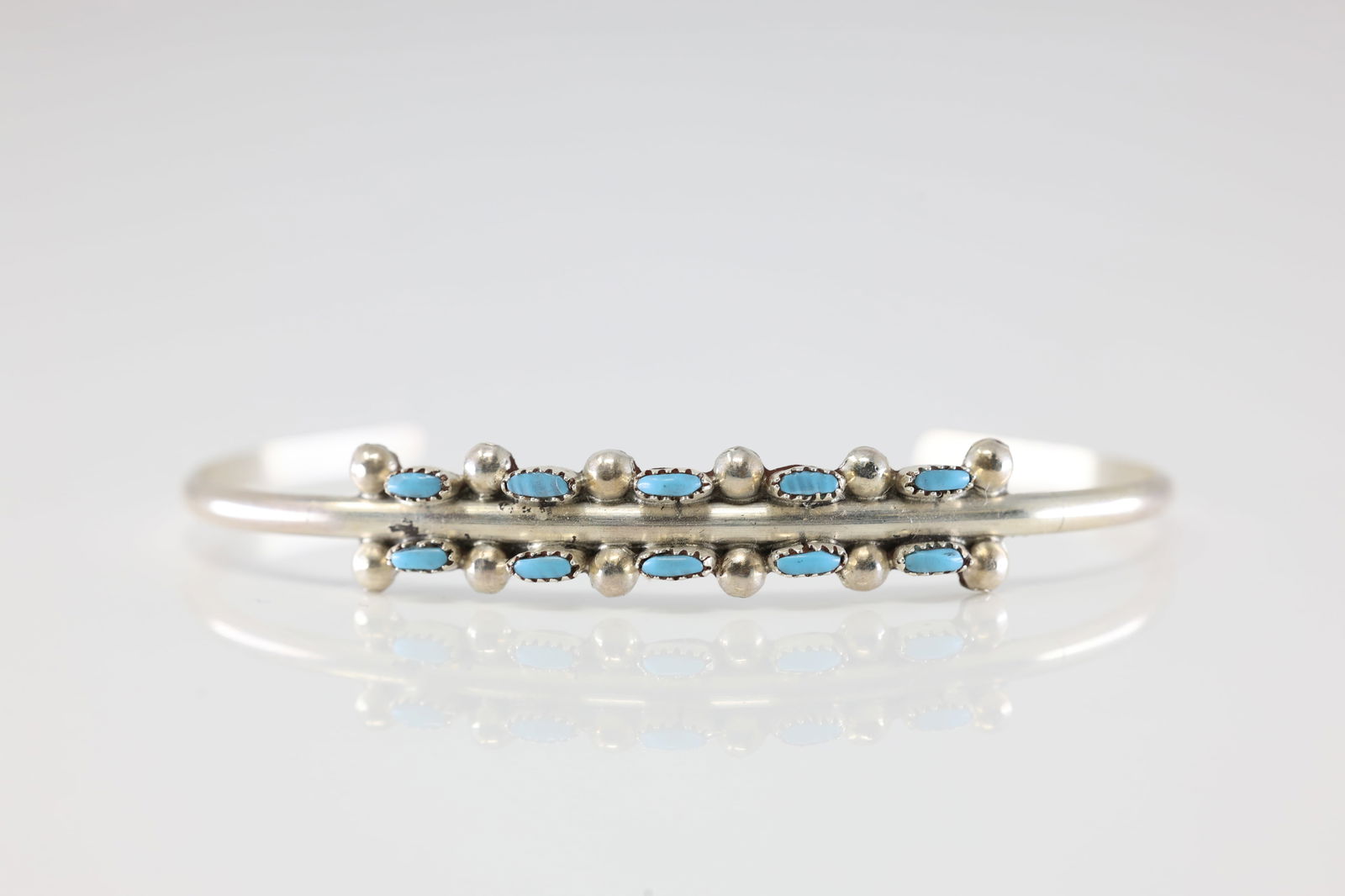 Native America Zuni Sterling Silver Turquoise Bracelet Cuff By D.N.: This is a Native America Zuni Sterling Silver Turquoise Bracelet Cuff By D.N. Stamp D.N.