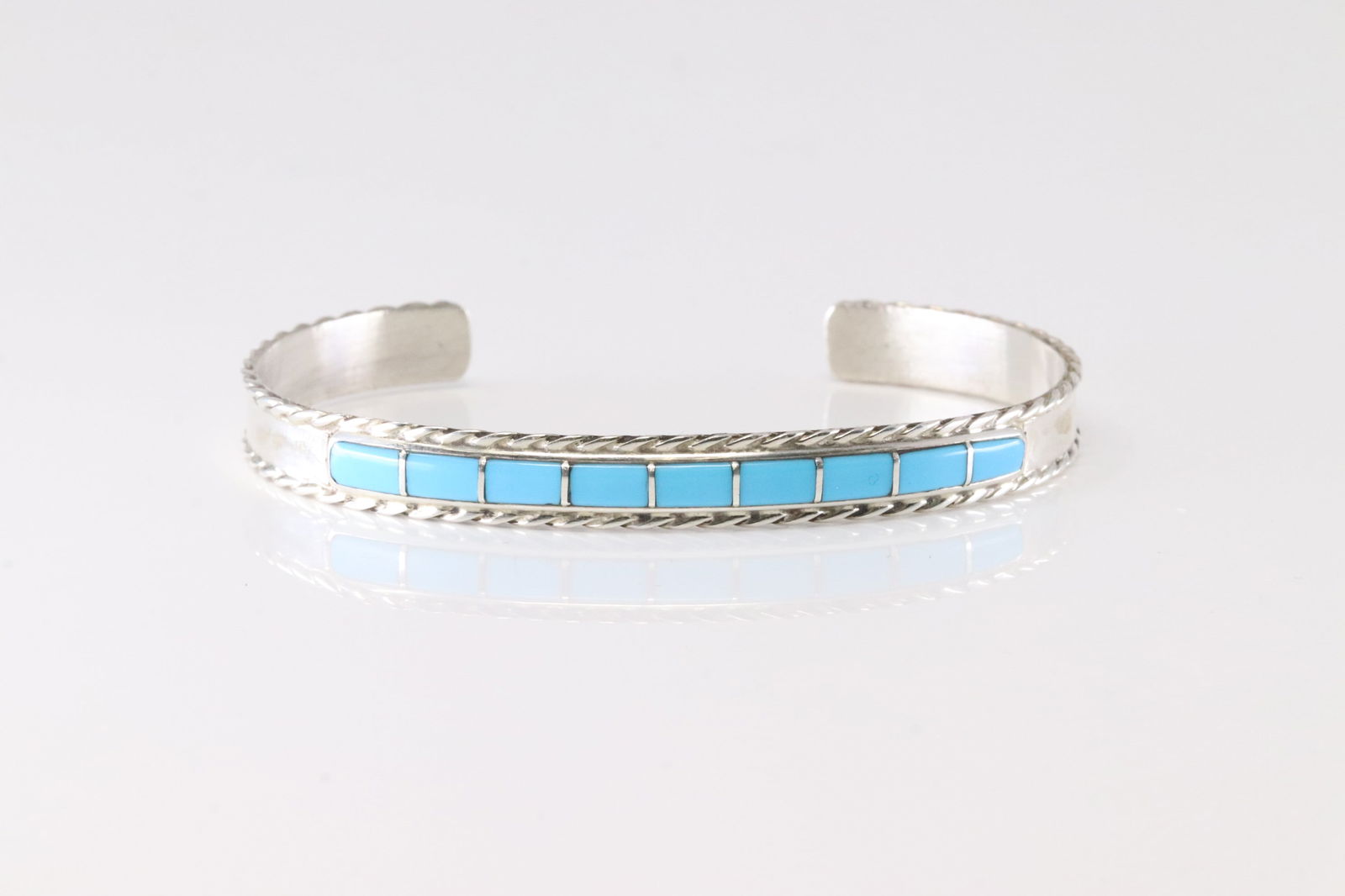 Native America Navajo Sterling Silver Turquoise Inlay Bracelet Cuff By JP.: This is a Native America Navajo Sterling Silver Turquoise Inlay Bracelet Cuff By JP. Stamp JP.