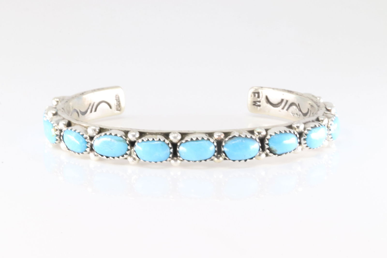 Native America Navajo Sterling Silver Kingman Turquoise Bracelet Cuff By E.W.: This is a Native America Navajo Sterling Silver Kingman Turquoise Bracelet Cuff By E.W. Stamp EW.