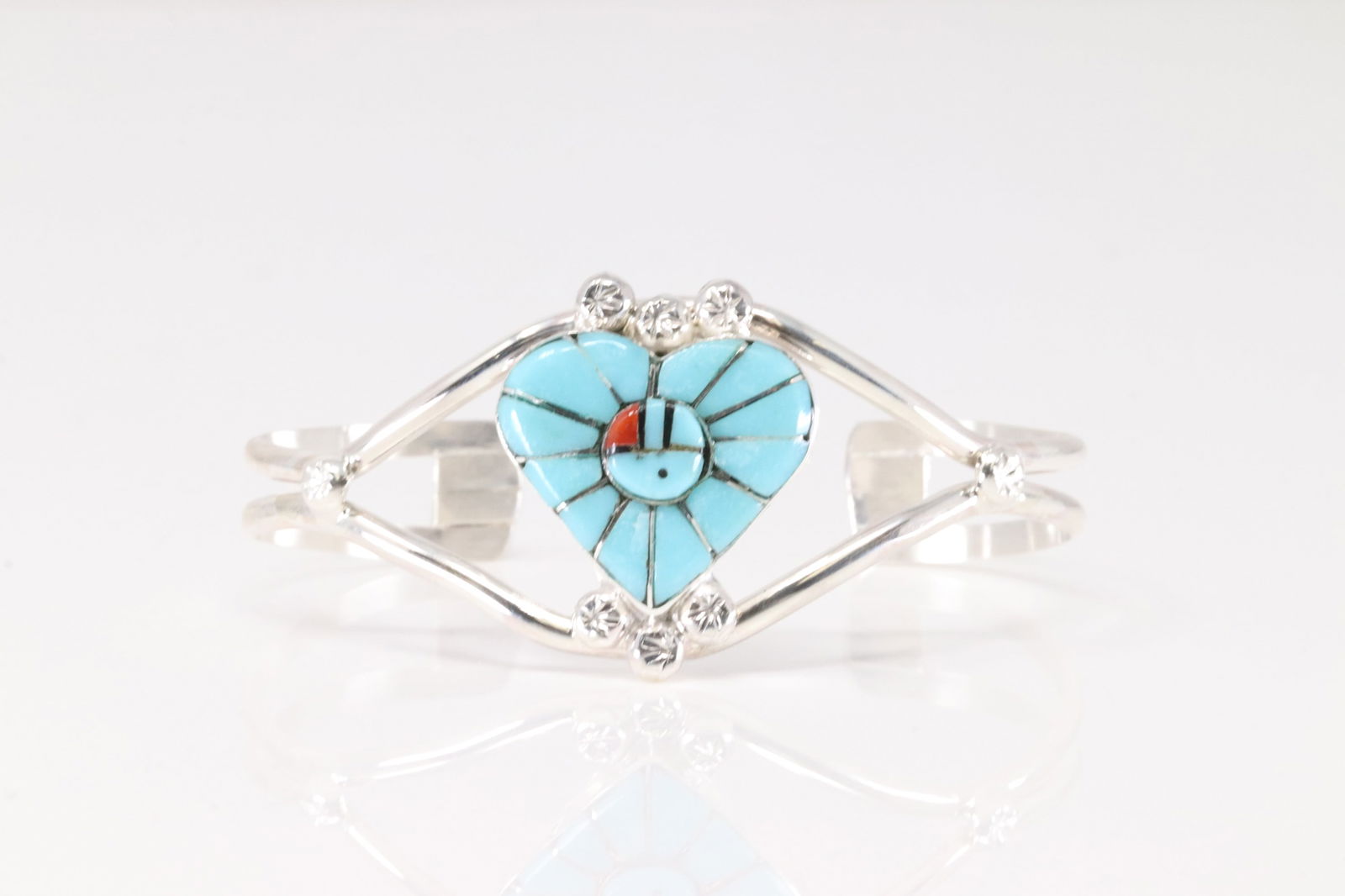 Native America Zuni Sterling Silver Multi-Color Inlay Heart Bracelet Cuff By Ola Eriacho.: This is a Native America Zuni Sterling Silver Multi-Color Inlay Heart Bracelet Cuff By Ola Eriacho. Stamp Eriacho.