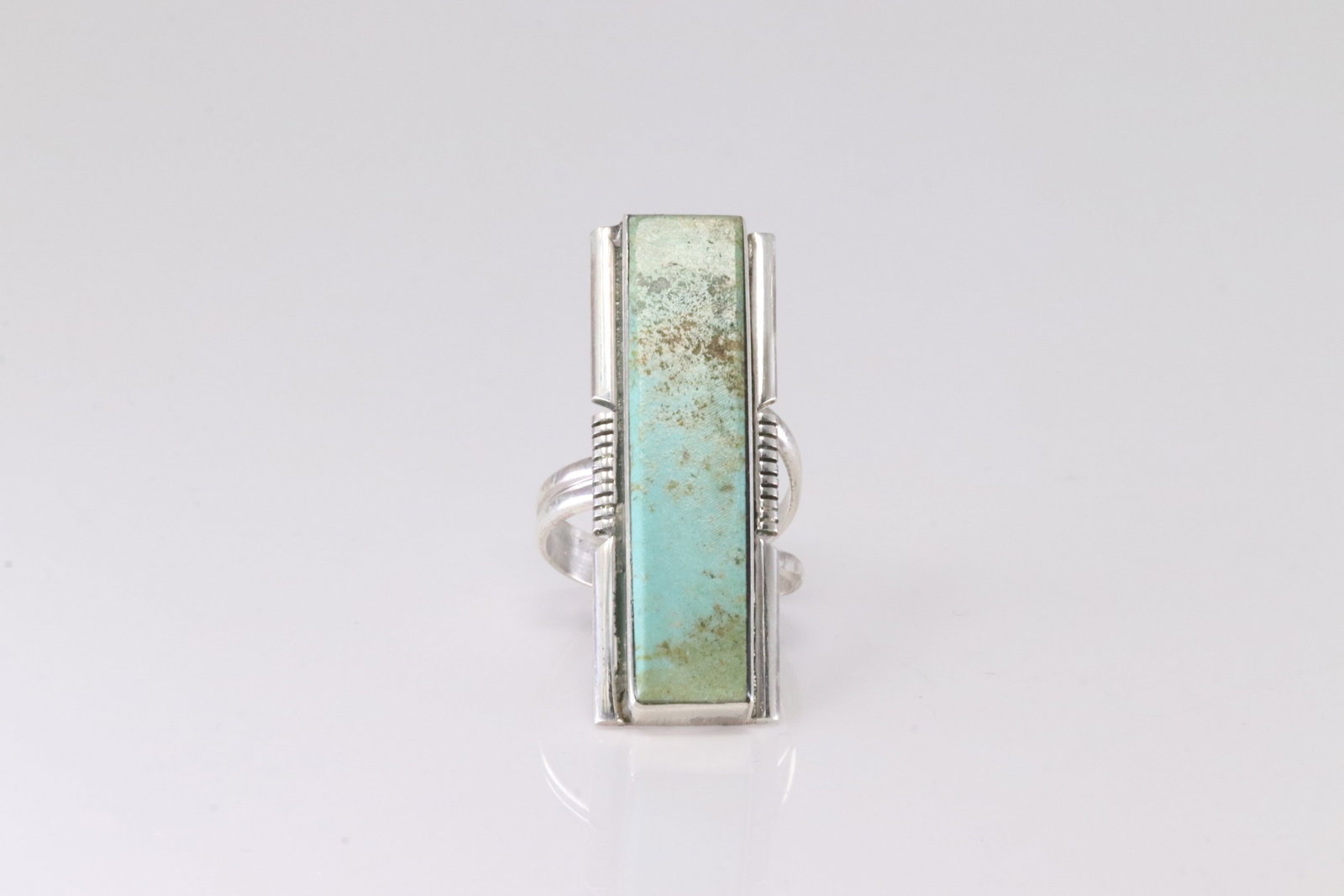 Native America Navajo Sterling Silver Turquoise Ring By SF.: This is a Native America Navajo Sterling Silver Turquoise Ring By SF. Stamp SF. Ring Size: 7.00.