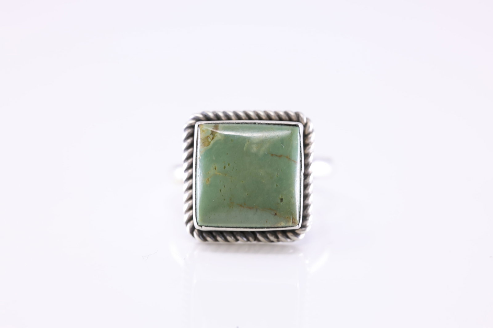 Native America Navajo Sterling Silver Turquoise Ring By J.: This is a Native America Navajo Sterling Silver Turquoise Ring By J. Stamp J. Ring size: 7.50.