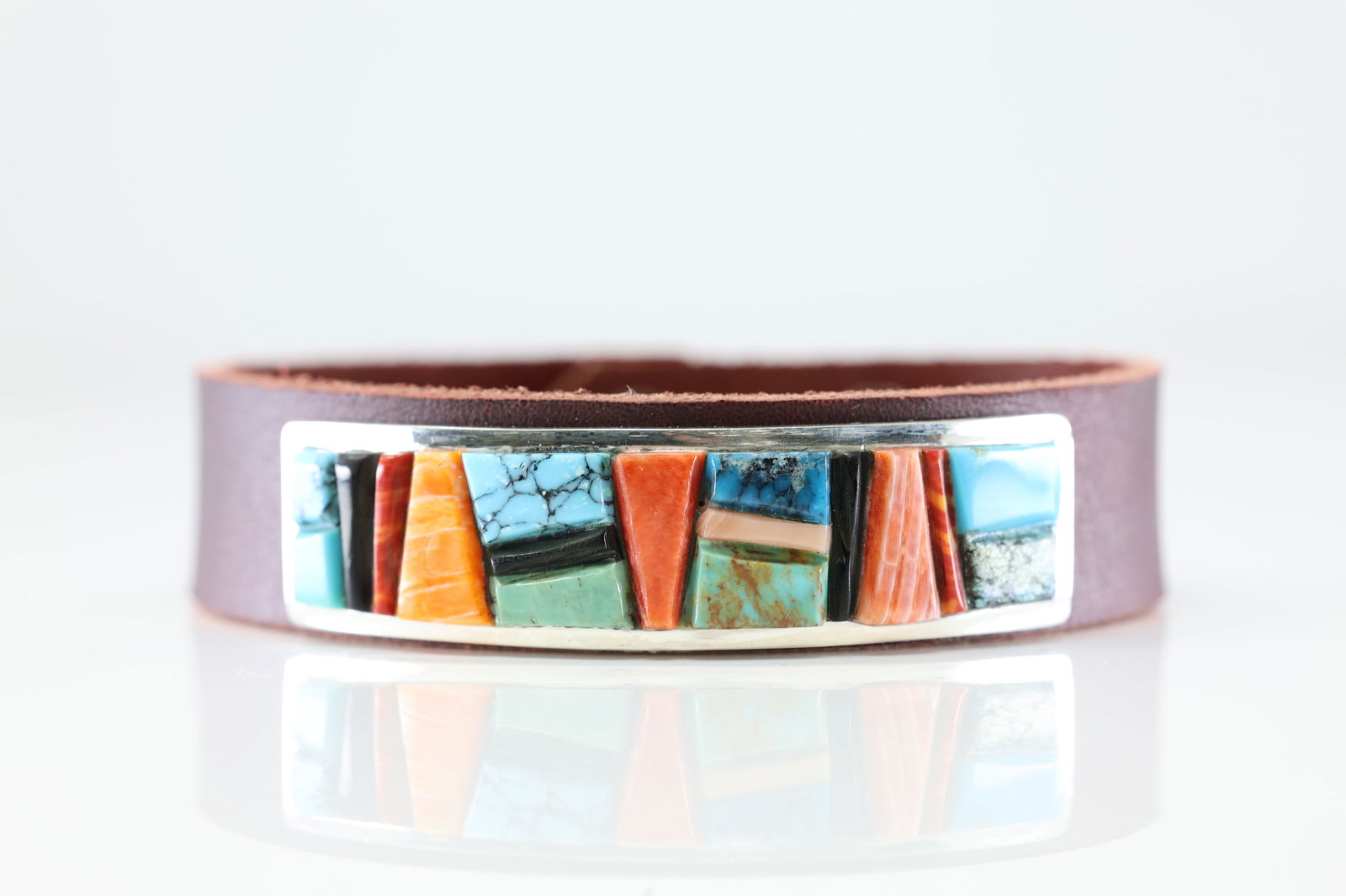 Native America Navajo Sterling Silver Multi-Color Stone Inlay Leather Bracelet By Hasi Hato.: This is a Native America Navajo Sterling Silver Multi-Color Stone Inlay Leather Bracelet By Hasi Hato. Bracelet length: 9.00"