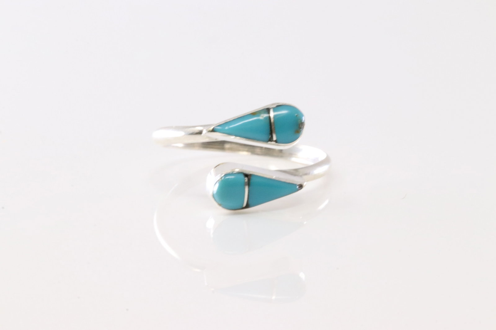 Native America Zuni Sterling Silver Turquoise Inlay Ring By RVN.: This is a Native America Zuni Sterling Silver Turquoise Inlay Ring By RVN. Stamp RVN. Ring Size: 9.00.