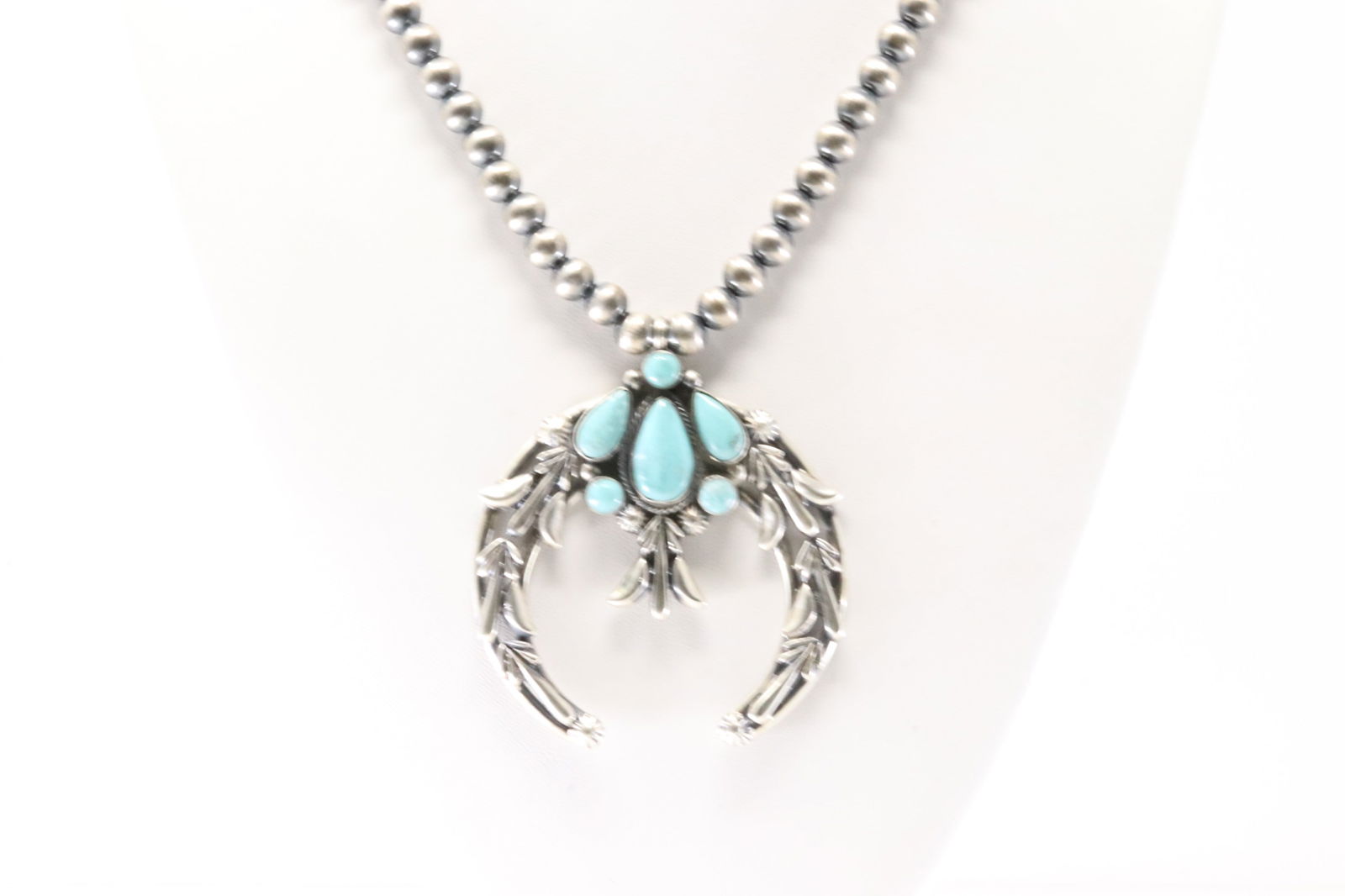 Native America Navajo Sterling Silver Turquoise Pendant By Bobby Platero. With Machine Made: This is a Native America Navajo Sterling Silver Turquoise Pendant By Bobby Platero. With Machine Made Stearling Silver Paerl Beaded Necklace. From R.B Company. Stamp R.B. Necklace Length: 20.00.