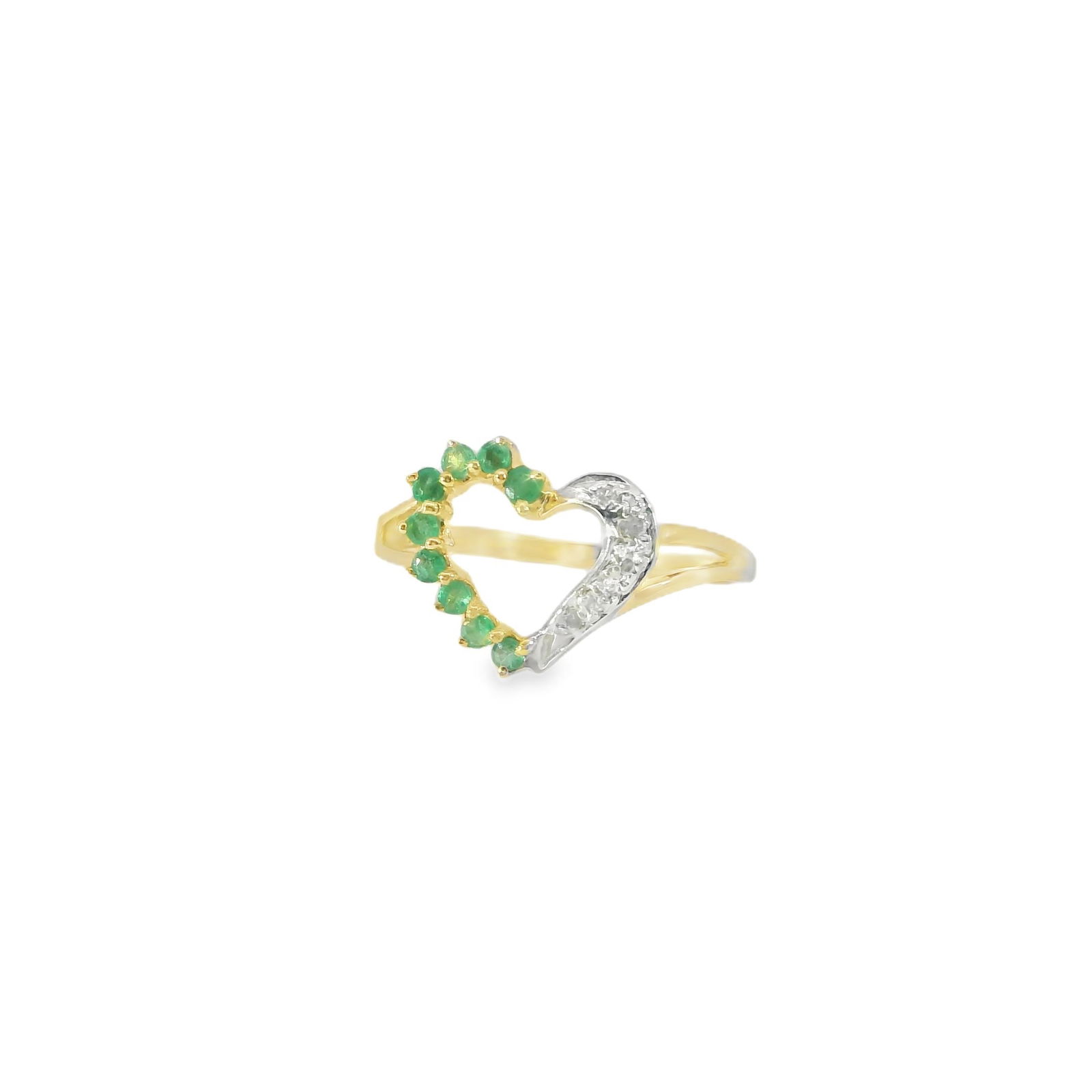Emerald & Diamond Heart Ring 10Kt: Ladies 10Kt Yellow Gold Emerald & Diamond Ring. This exquisite heart-shaped ring features a delicate blend of sparkling emeralds and shimmering diamonds, set in a sleek gold band. Perfect for adding