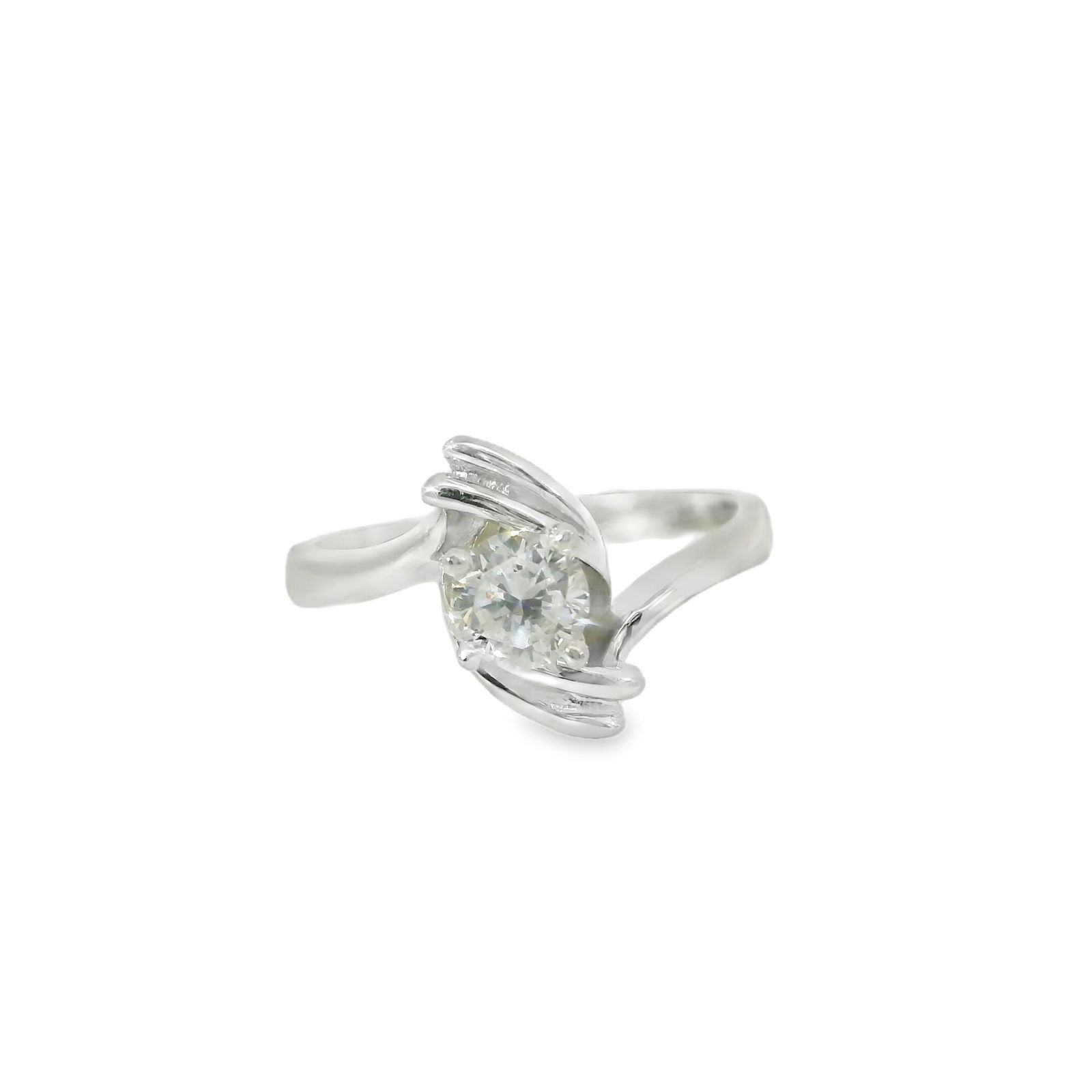Diamond Ring 14Kt.: Ladies 14Kt White Gold Diamond Ring. This exquisite silver ring features a brilliant round-cut diamond, elegantly set in a modern design that captures light from every angle. Perfect for engagements o