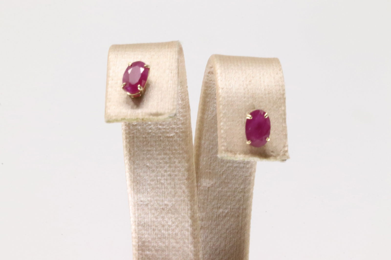 Ruby Stud Earring 14Kt.: Ladies 14Kt Yellow Gold Ruby Stud Earring. This Charming Stud Earring's has Pink Oval Rubies. Ruby Measure: 6x4mm.