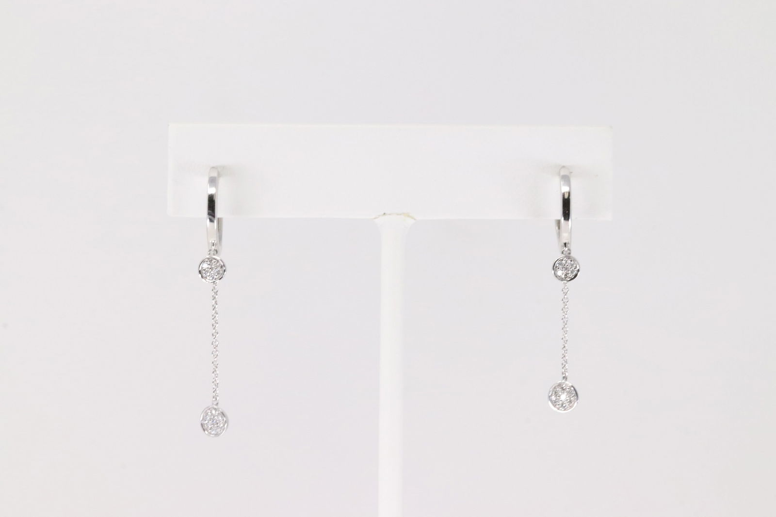 Diamond Hoop Earring 14Kt.: Ladies 14Kt White Gold Diamond Hoop Earring. This Elegant Hoop Earring has 28 Sparkling Diamonds. Diamonds weight: 0.15ctw.