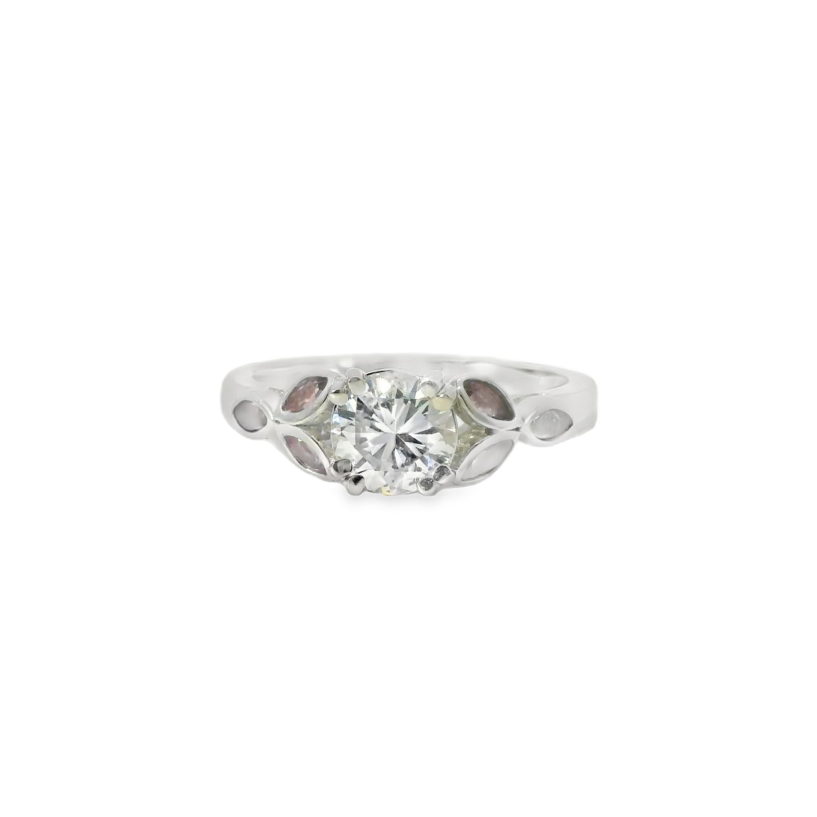 Pink Gemstone & Diamond Ring 14Kt.: Ladies 14Kt White Gold Pink Gemstone & Diamond Ring. This exquisite ring features a brilliant round diamond at its center, flanked by delicate pink gemstone accents. The sleek white band enhances the