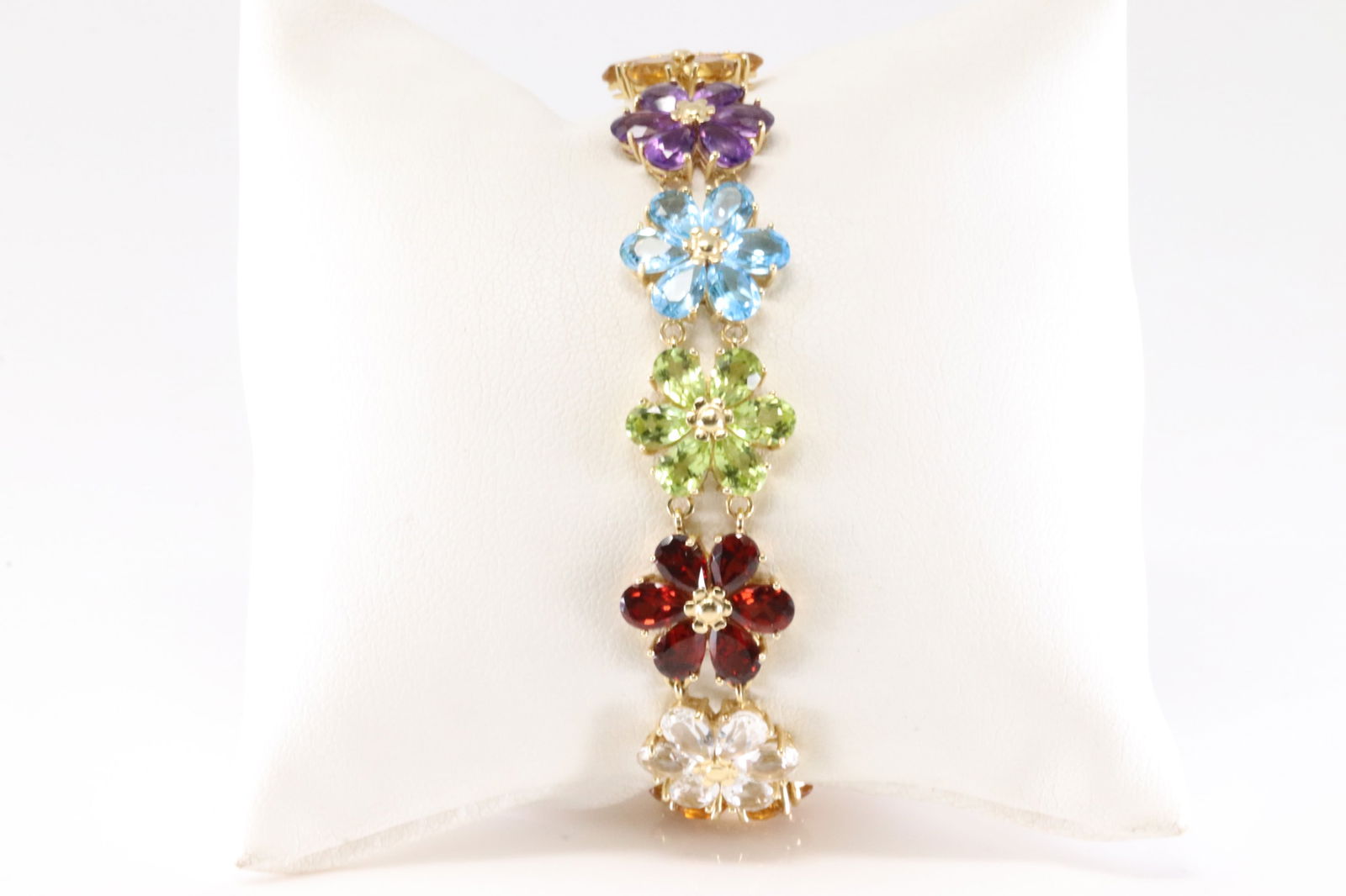 Multi-Color Gemstone Flower Bracelet 14Kt.: Ladies 14Kt Yellow Gold Multi-Color Gemstone Flower Bracelet. This Charming Bracelet has Flowers Design with Multi-Color Gemstone. Bracelet length: 8.00" Total weight: 17.55 Grams.