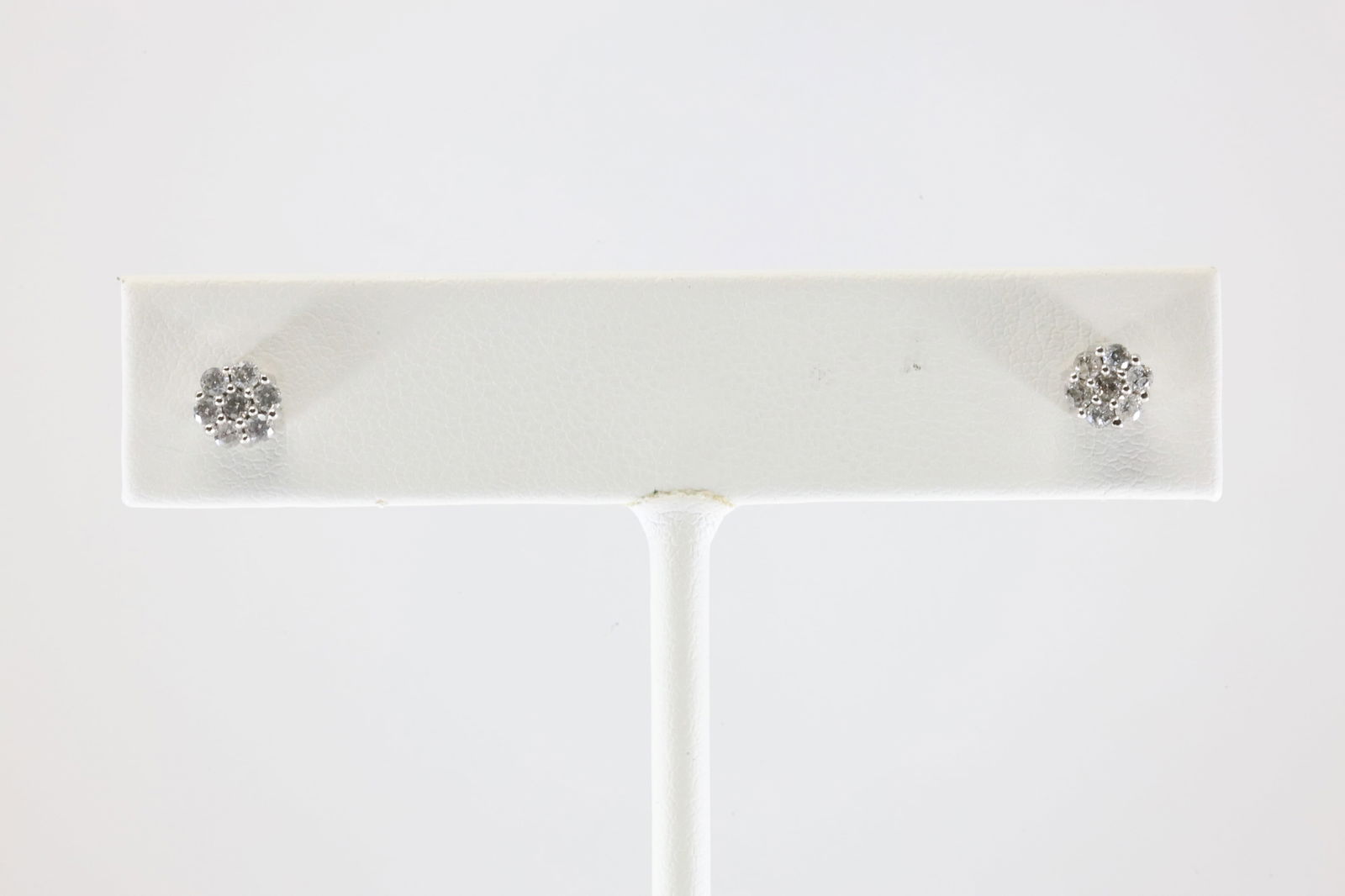 Diamond Stud Earring 10Kt.: 10Kt White Gold Diamond Stud Earring. This Charming Stud Earring has Sparkling Diamonds. Diamonds weight: 0.25ctw.