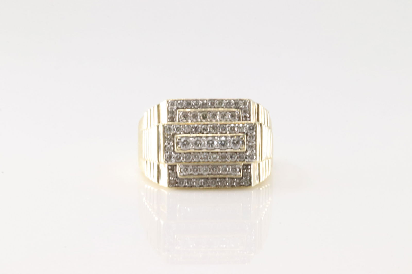 Cube Diamond Ring 14Kt.: Men 14Kt Yellow Gold Cube Diamond Ring. This elegant ring has 7 row with 65 sparkling round diamonds. Diamonds weight approx: 1.25cttw. Ring size: 11.75. Total weight: 12.10 Grams.