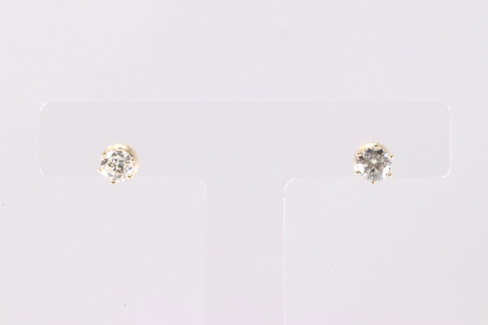 Diamond Stud Earring 14Kt.: Ladies 14Kt Yellow Gold Diamond Stud Earring. This Charming Stud Earring's has Sparkling round Diamond. Diamond weight approx: 1.00 ctw