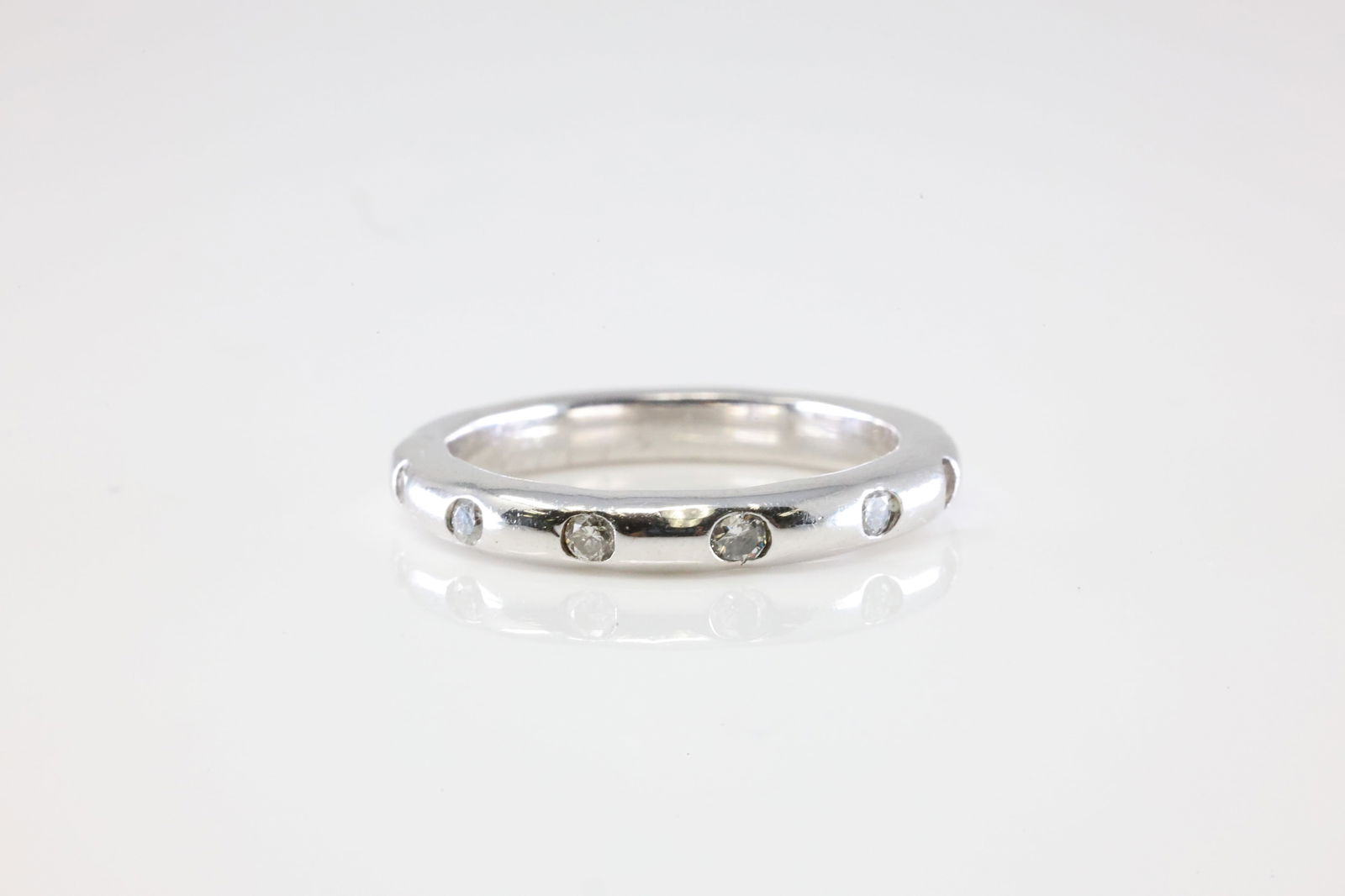 Eternity Diamond Ring 14Kt.: Ladies 14Kt White Gold Eternity Diamond Ring. This Eternity Gorgeous Ring has Sparkling Diamonds. Diamonds approx: 0.30ctw. Ring size: 6.50. Total weight: 4.21 Grams.