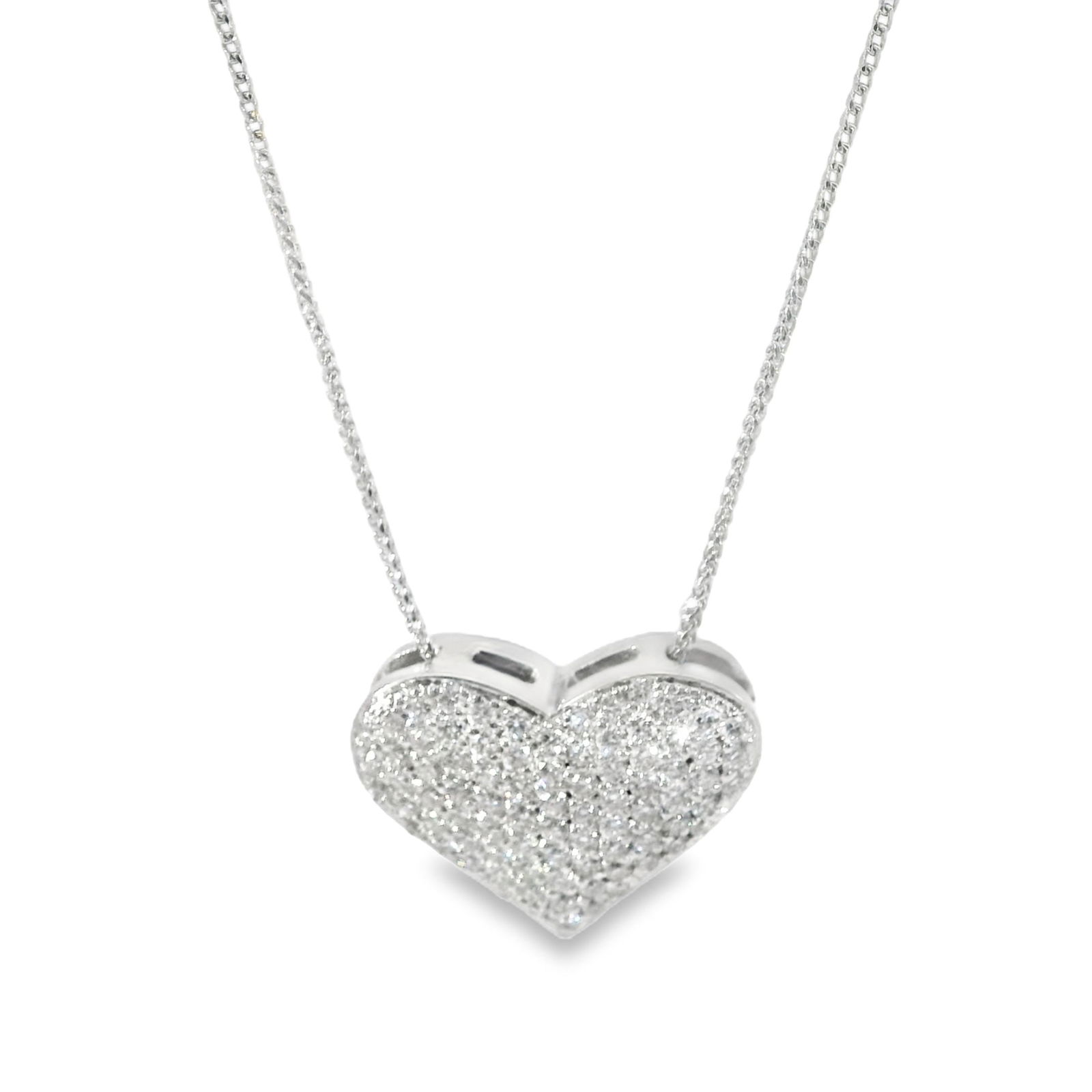 Diamond Heart Pendant / Necklace 14Kt.: 14Kt White Gold Diamond Heart Pendant / Necklace. This exquisite heart-shaped diamond pendant is a dazzling masterpiece, encrusted with shimmering diamonds that catch the light beautifully. Suspended
