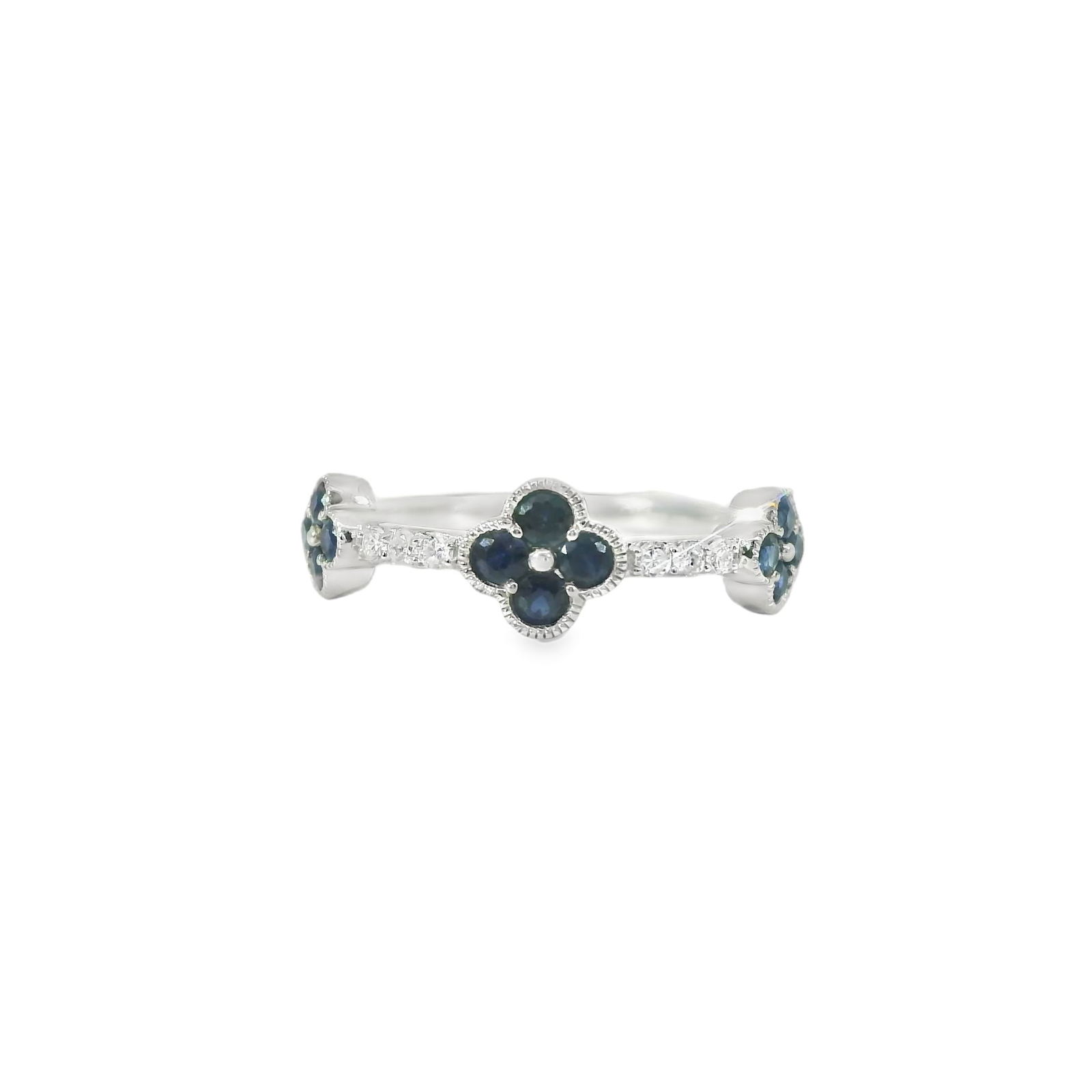 Sapphire & Diamond Floral Ring 14Kt.: Ladies 14Kt White Gold Sapphire & Diamond Floral Ring. This exquisite ring features a delicate floral design with sapphire's and diamonds, perfect for adding a touch of elegance to any outfit.