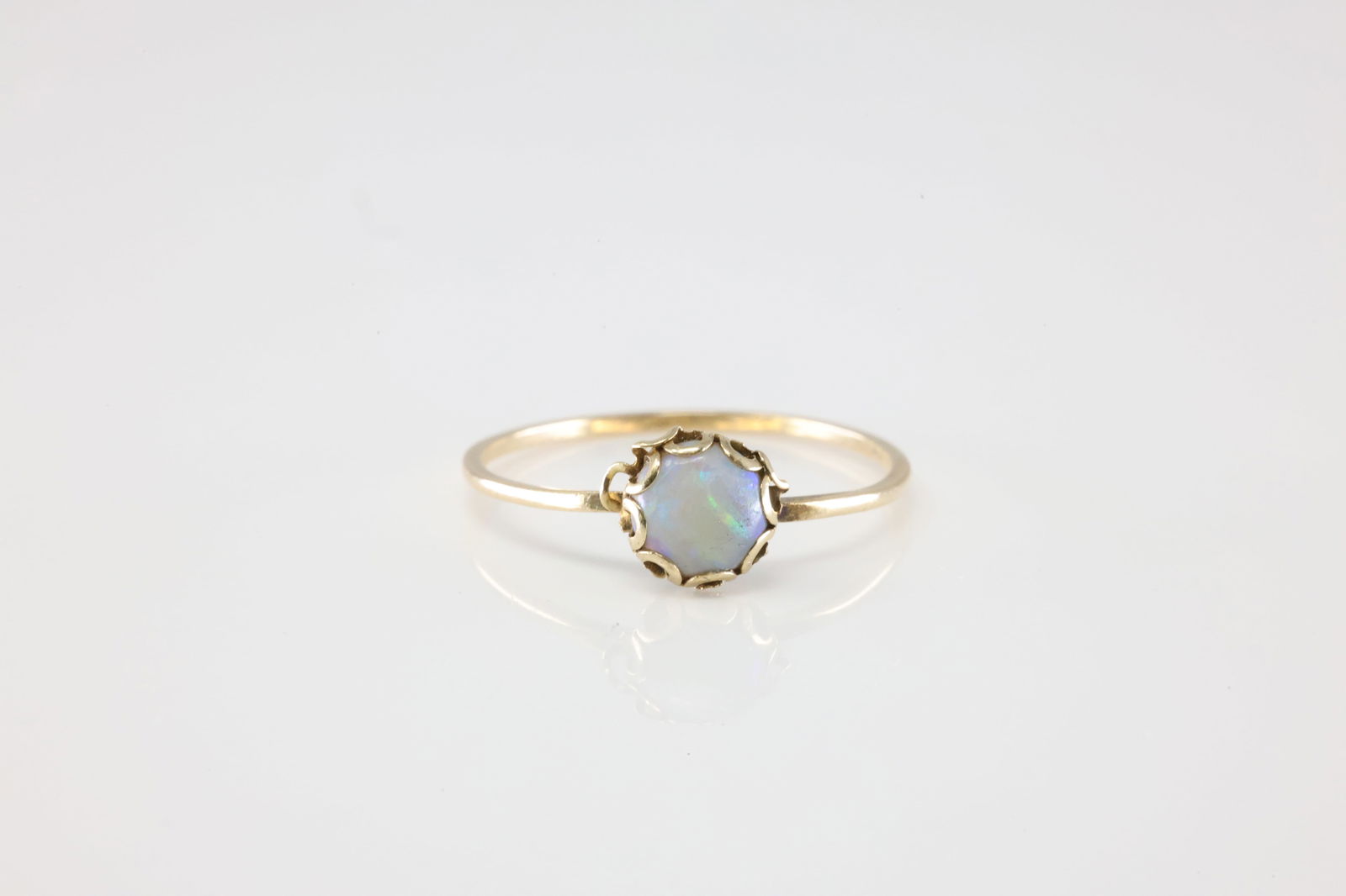 Opal Ring 14Kt.: 14Kt Yellow Gold Opal Ring. This Ring has Solitaire Opal Gemstone. Ring size: 5.50.