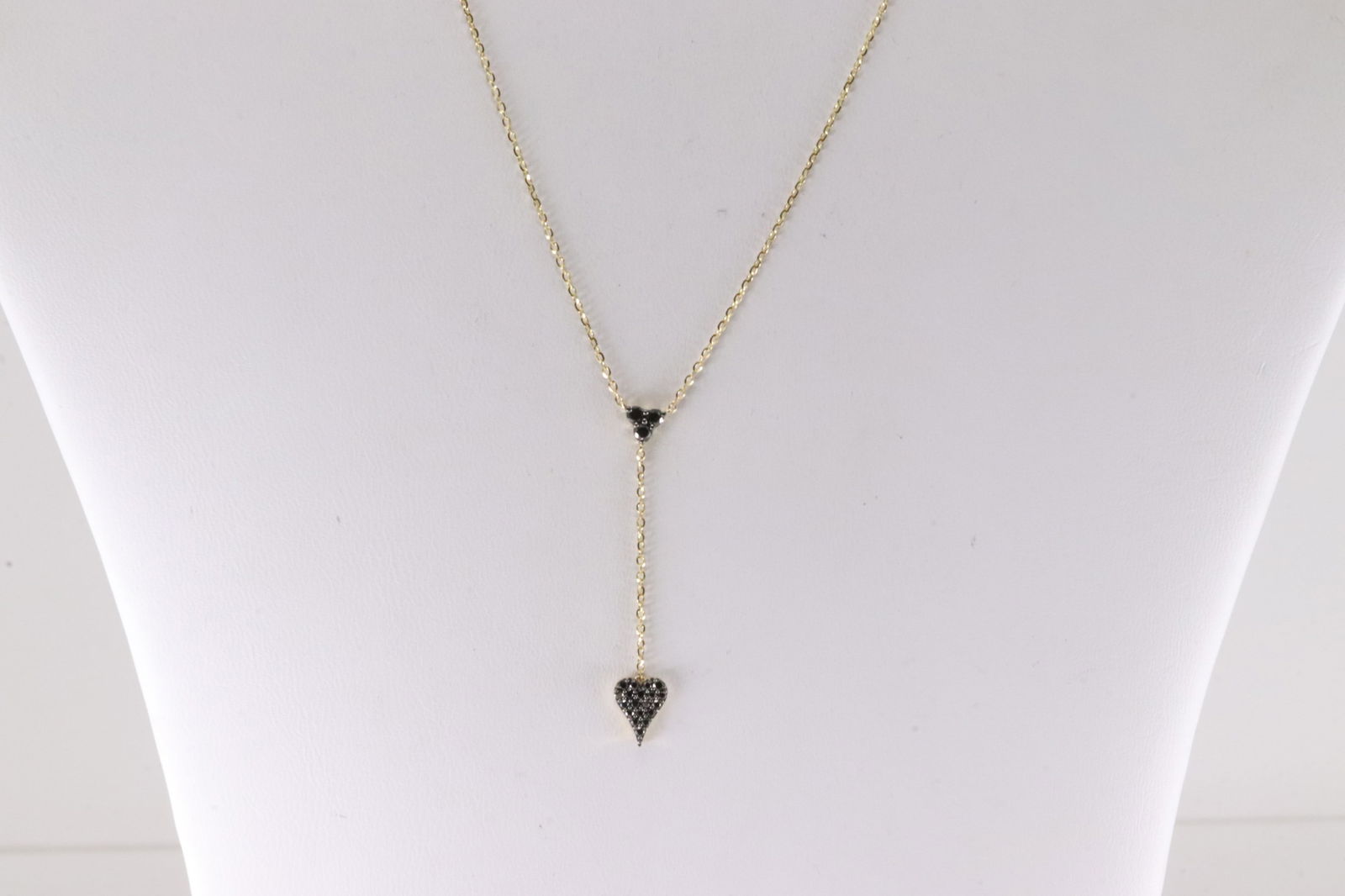 Black Diamond Heart Necklace 14Kt.: Ladies 14Kt Yellow Gold Black Diamond Heart Necklace. This Necklace has Heart Charm with Black Diamonds. Diamonds weight: 0.20ctw. Necklace length: 18.00"