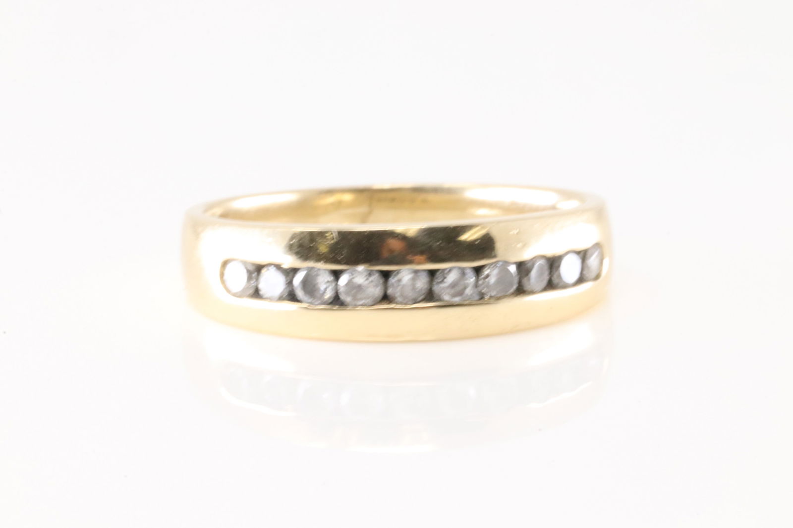 Wedding Diamond Ring 14Kt.: 14Kt Yellow Gold Wedding Diamond Ring. This classic ring ban design has 10 sparkling round diamonds. Diamonds weight approx: 0.50cttw. Ring size: 9.00. Total weight: 5.00 Grams.